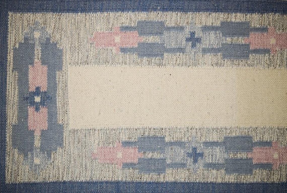 Swedish handwoven wool rug with fringes in the 