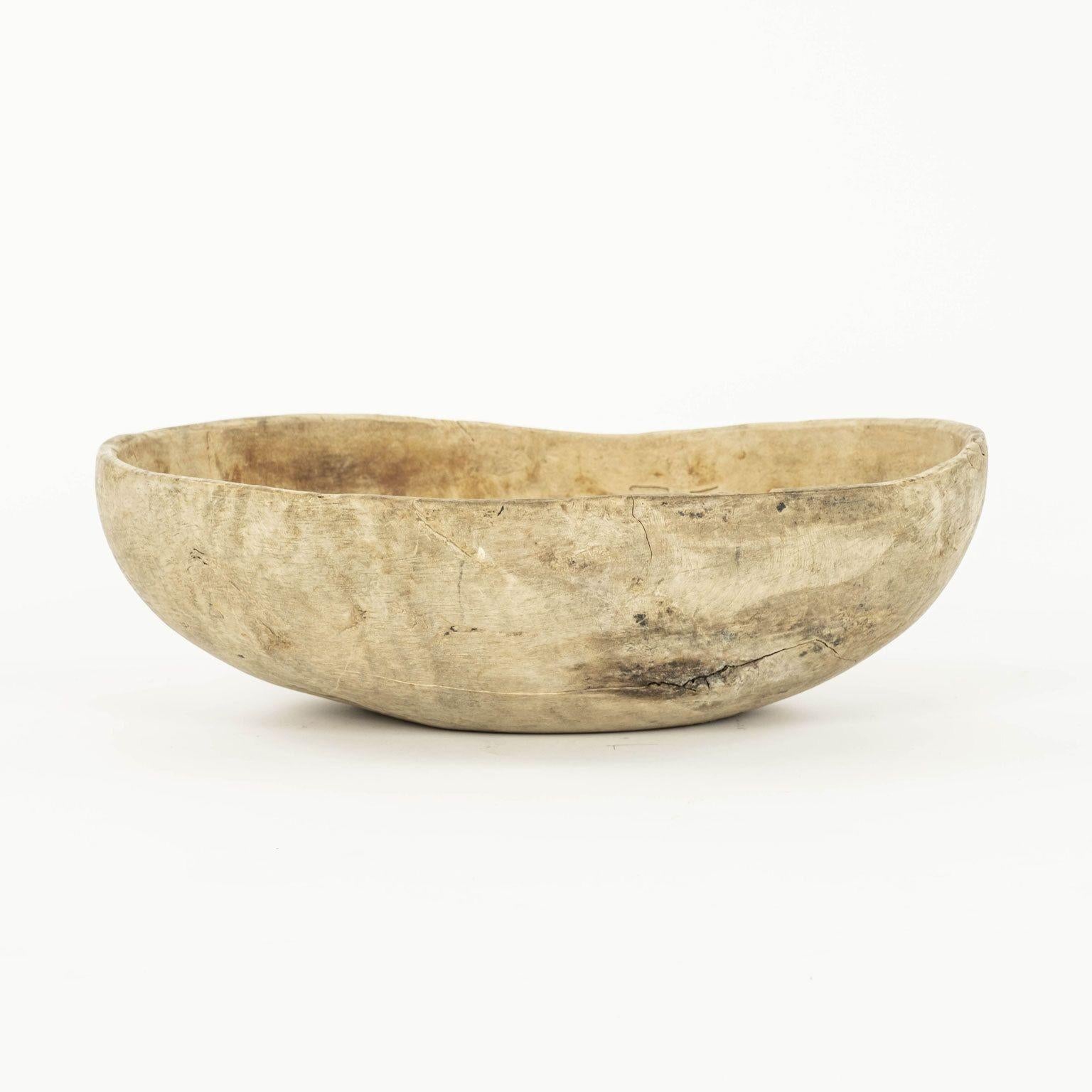 Swedish naturally-bleached root wood bowl: large hand-carved burled oval-like triangular-shape root wood bowl with exquisite patina.