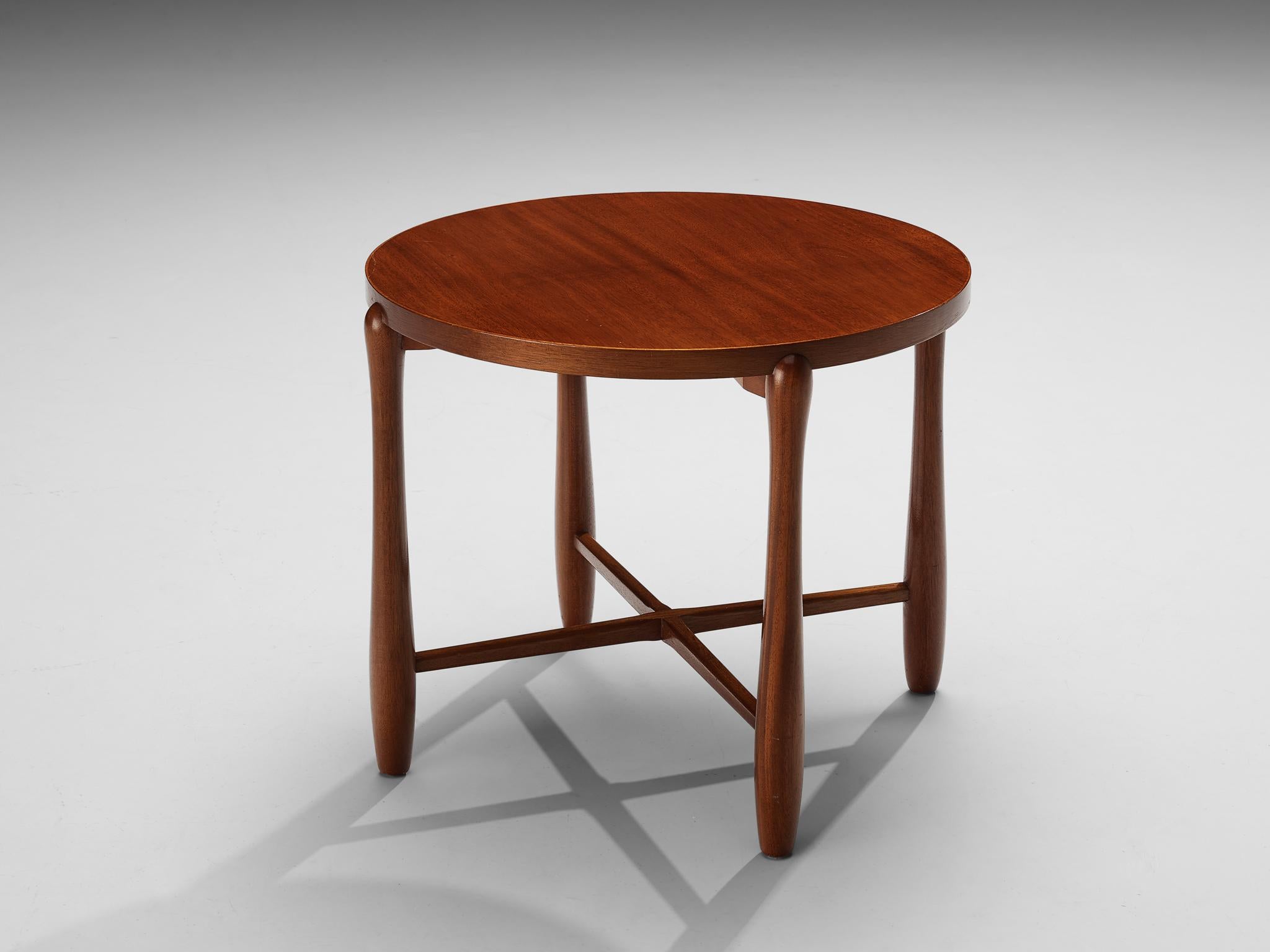 Coffee table, mahogany, Sweden, 1950s

This delicate table that originates from Sweden is well-constructed in a precise manner composed of subtle and modest lines, resulting in an eloquent and simplistic furniture piece that is typical for Swedish