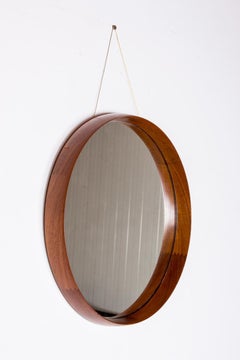 Swedish round wall mirror in Teak and Brass by Uno & Östen Kristiansson/Luxus.