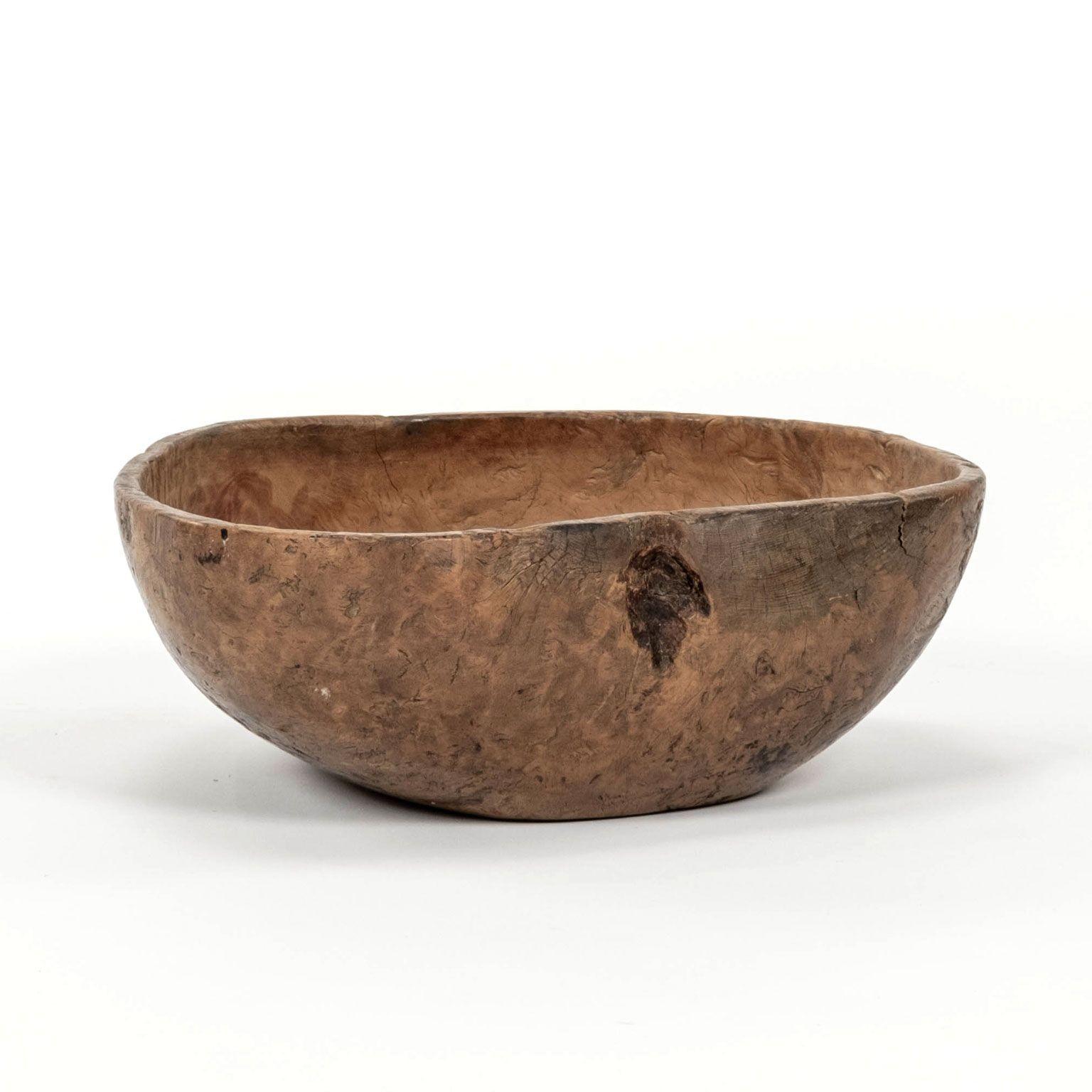 Swedish round yellow ocher-painted primitive dugout root bowl. Dates to mid-19th century. Beautiful burled grain. Inscribed underneath 