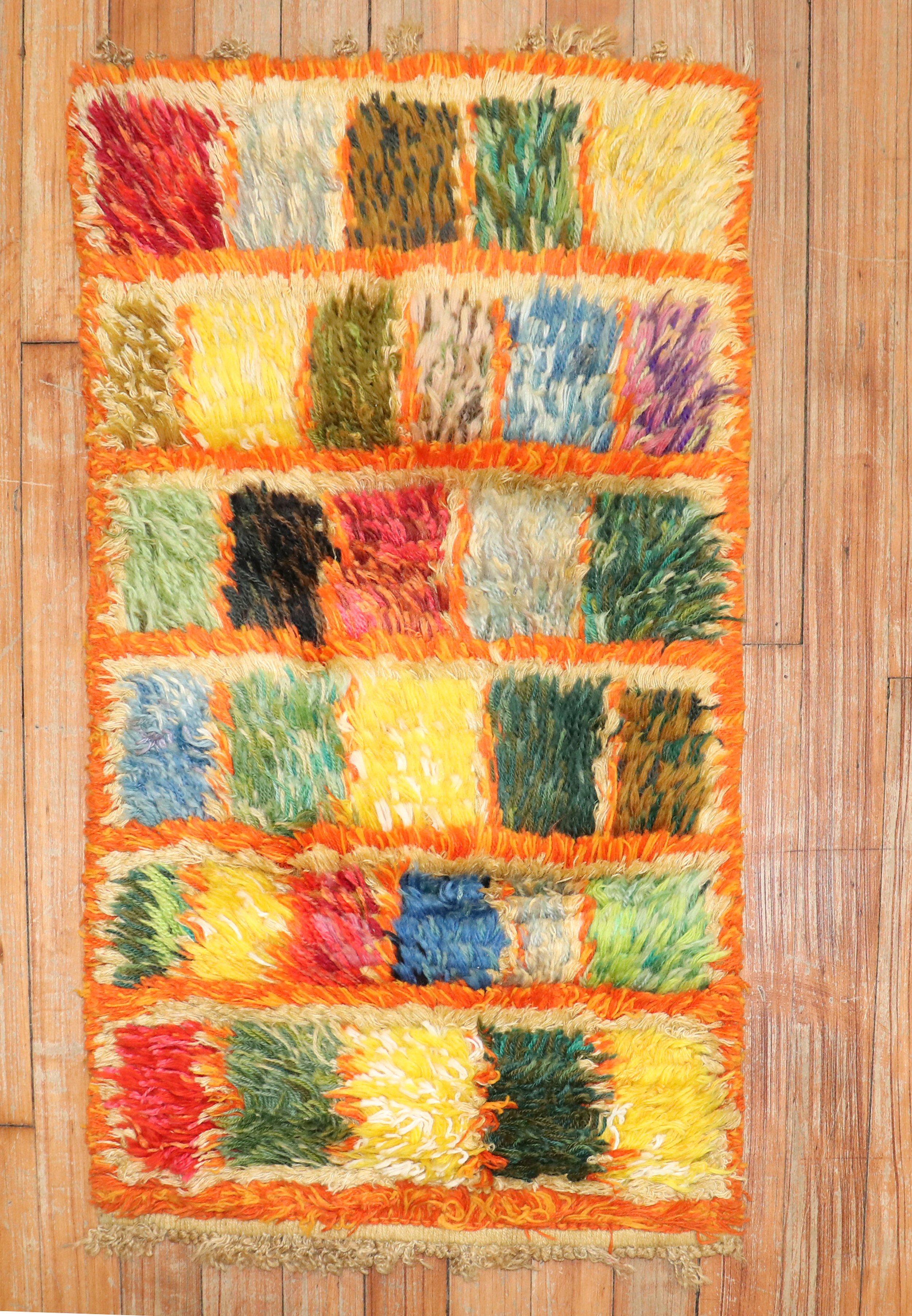 Marvelous small plush Swedish Rya rug from the 3rd quarter of the 20th century.

Measures: 1'5” x 2'6”

Swedish Rya rugs are extremely colorful, lovely and quite chic and each have their own character to them. They tend to have thicker shaggy
