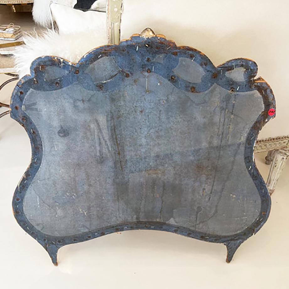 Quite possibly one of the most delightful and unique decorative items we've seen. This wood screen was used to shade light coming into the window from the inside. It has an exquisite shape and feet that makes it so versatile. Hanging on a wall,