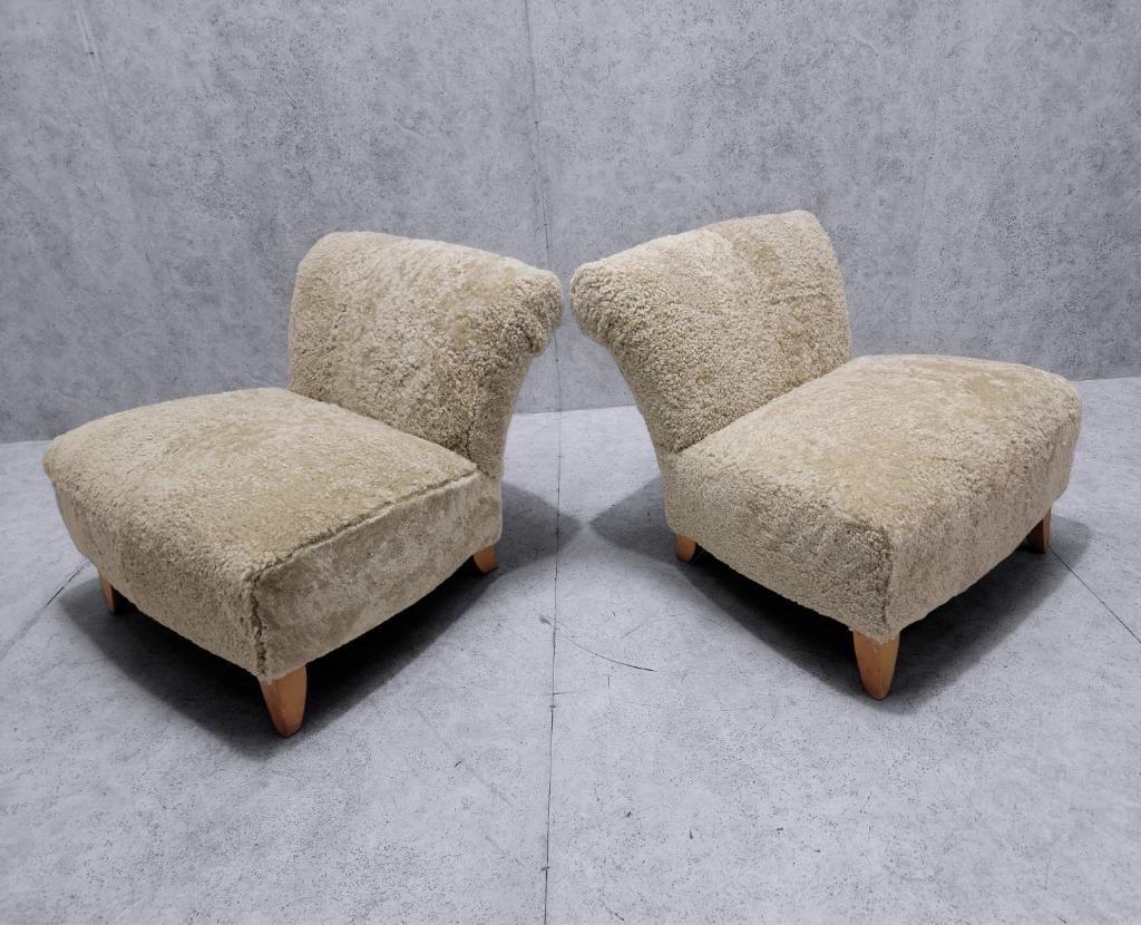 Mid-Century Modern Swedish Scroll Back Slipper Chairs Newly Upholstered in Natural Sheep's Wool (2) For Sale