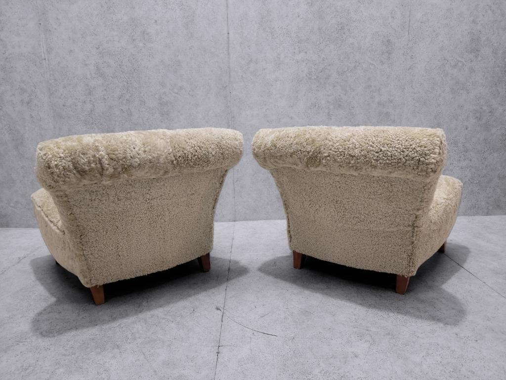 20th Century Swedish Scroll Back Slipper Chairs Newly Upholstered in Natural Sheep's Wool (2) For Sale