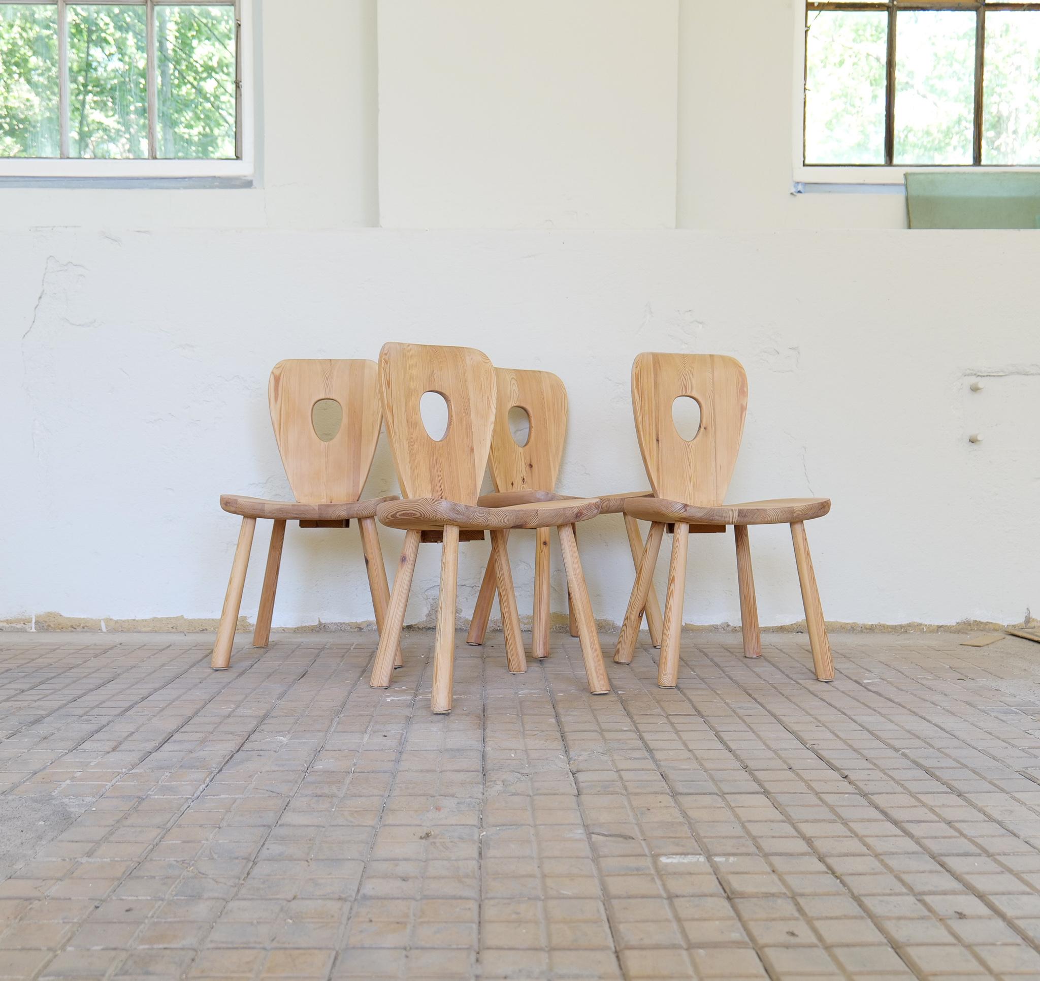 These rare sculptural studio chairs designed by Bo Fjaestad and manufactured in Arvika Sweden during the late 1930s. They were made at Arvika Konsthantverk. 
are a great example of what was called cabin furniture during this time in Sweden. The