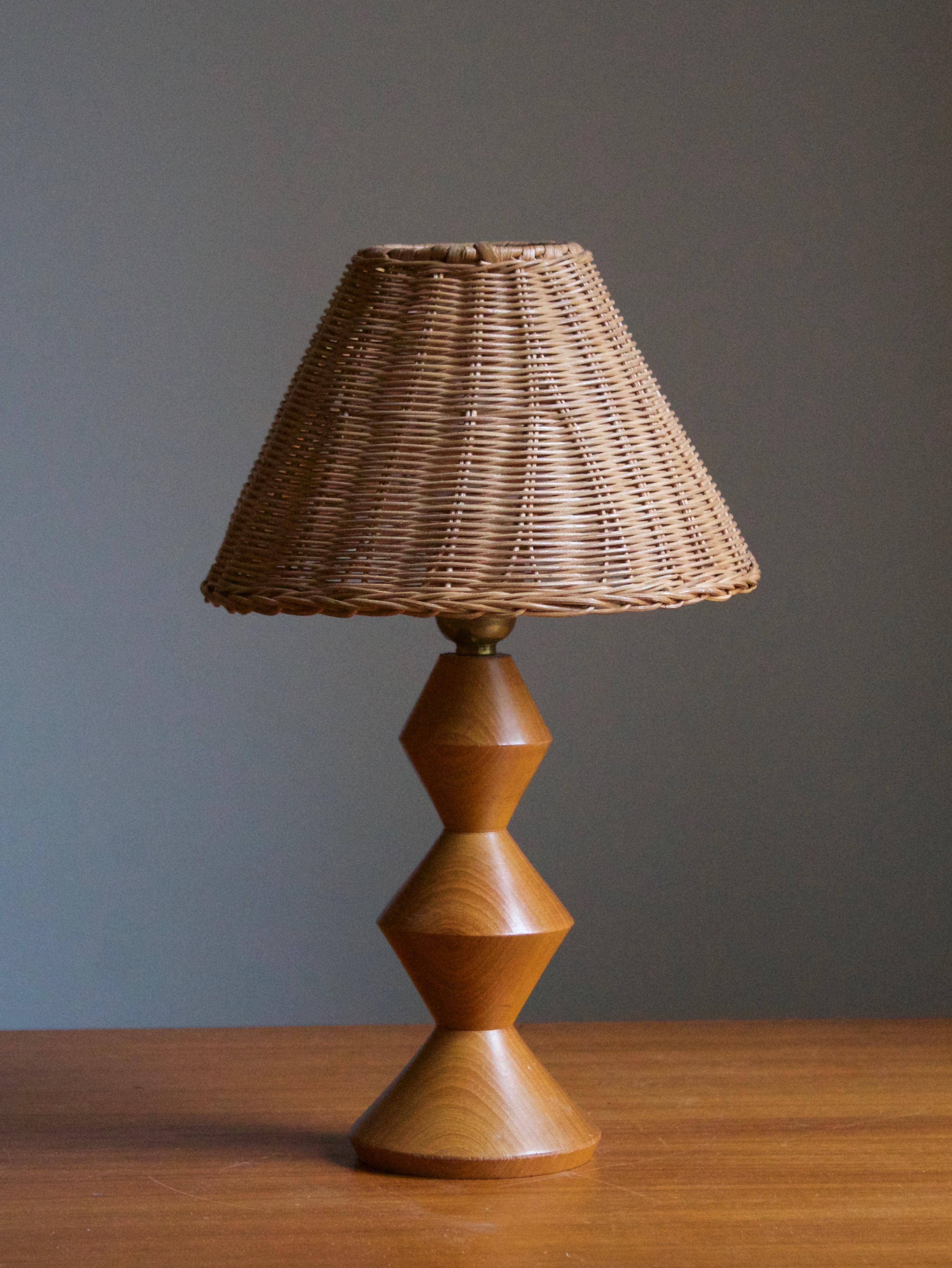 A table lamp designed and produced in Sweden in, c. 1960s.

Stated dimensions exclude lampshade, height includes the socket. Sold without lampshade.