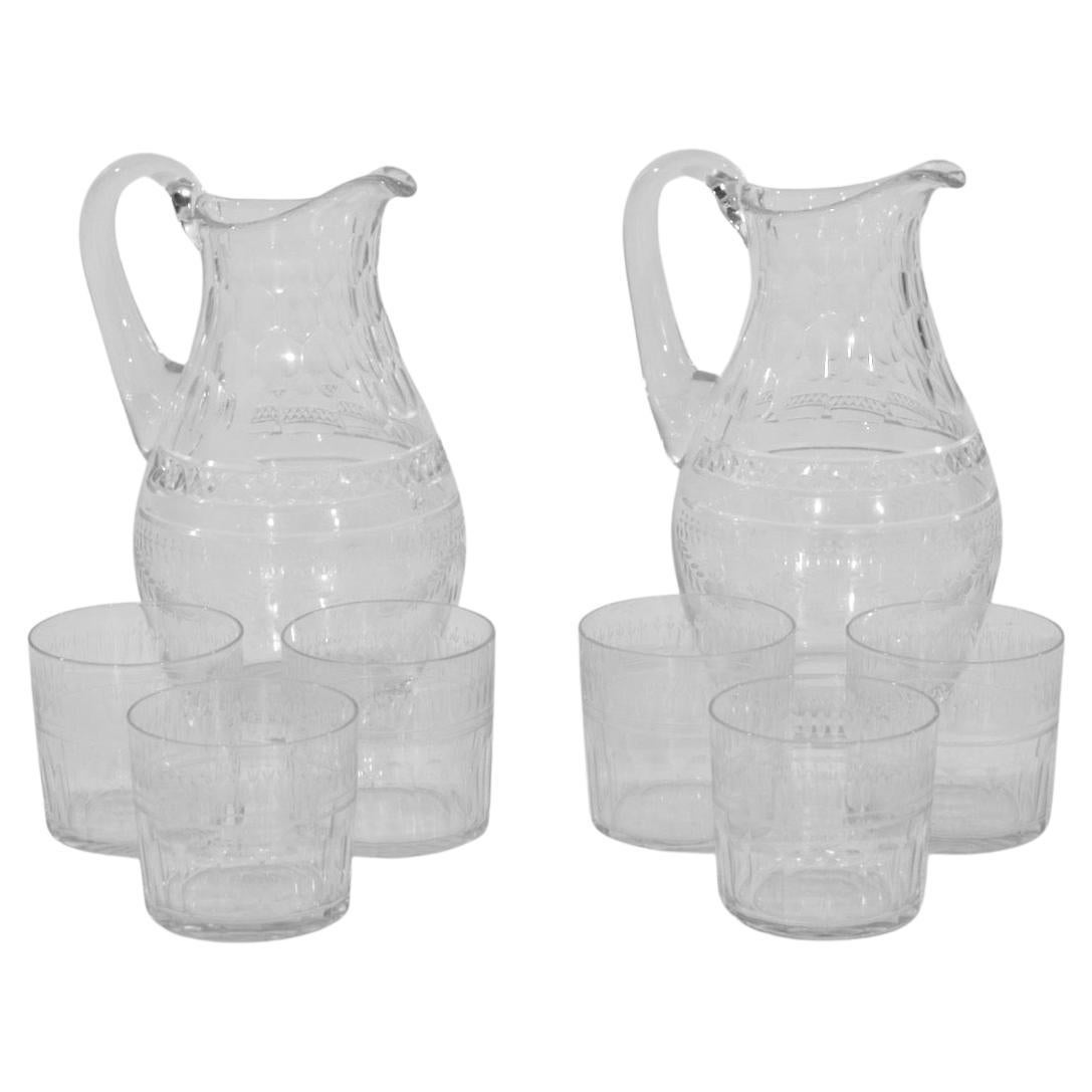 Schwedische Glasgarnitur, mit zwei Karaffen und sechs Gläsern, um 1880.