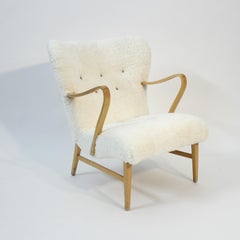 Swedish sheepskin lounge chair, attributed to Erik Bertil Karlén, 1940s