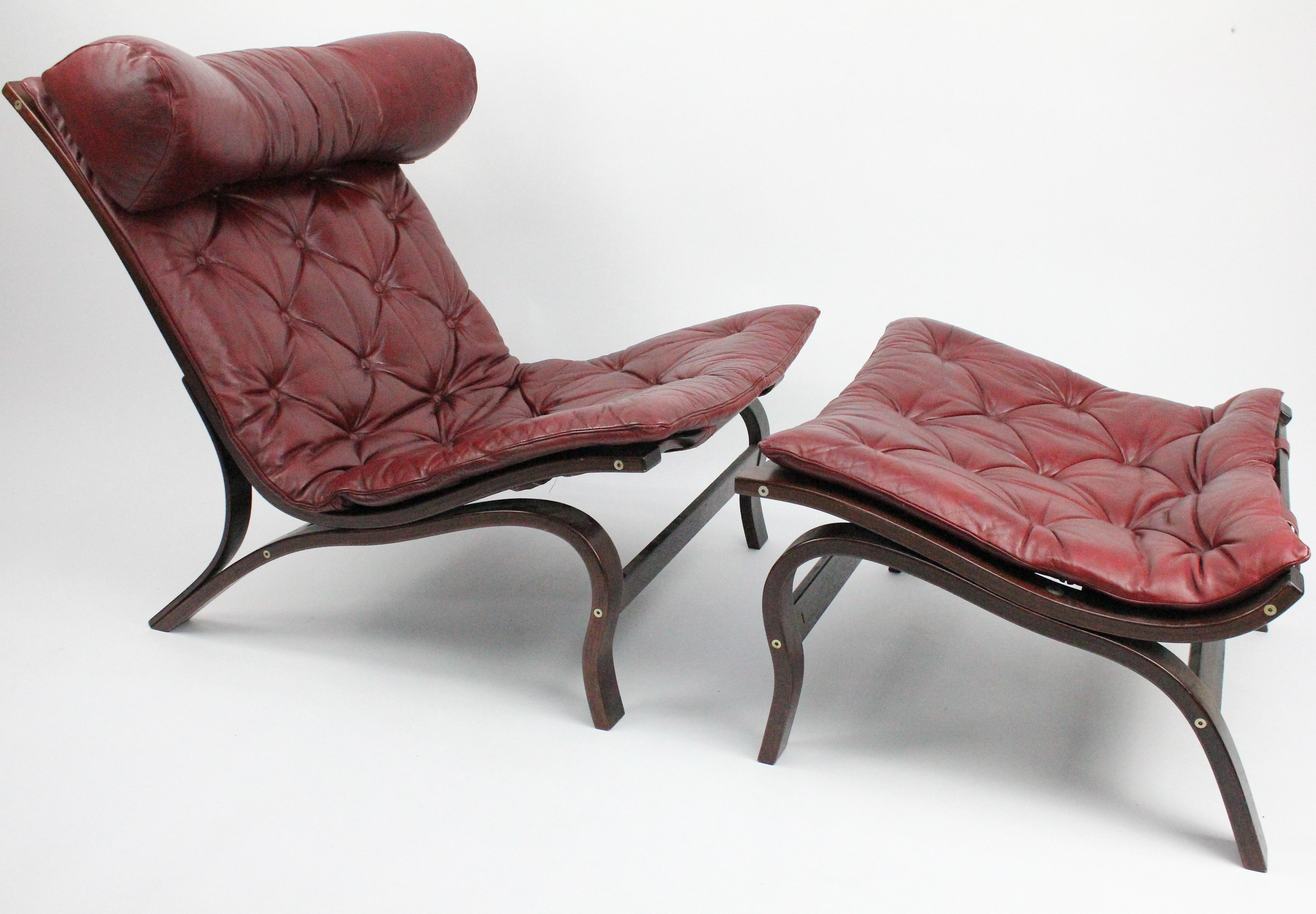 Rare lounge chair with ottoman by Arne Norell. 