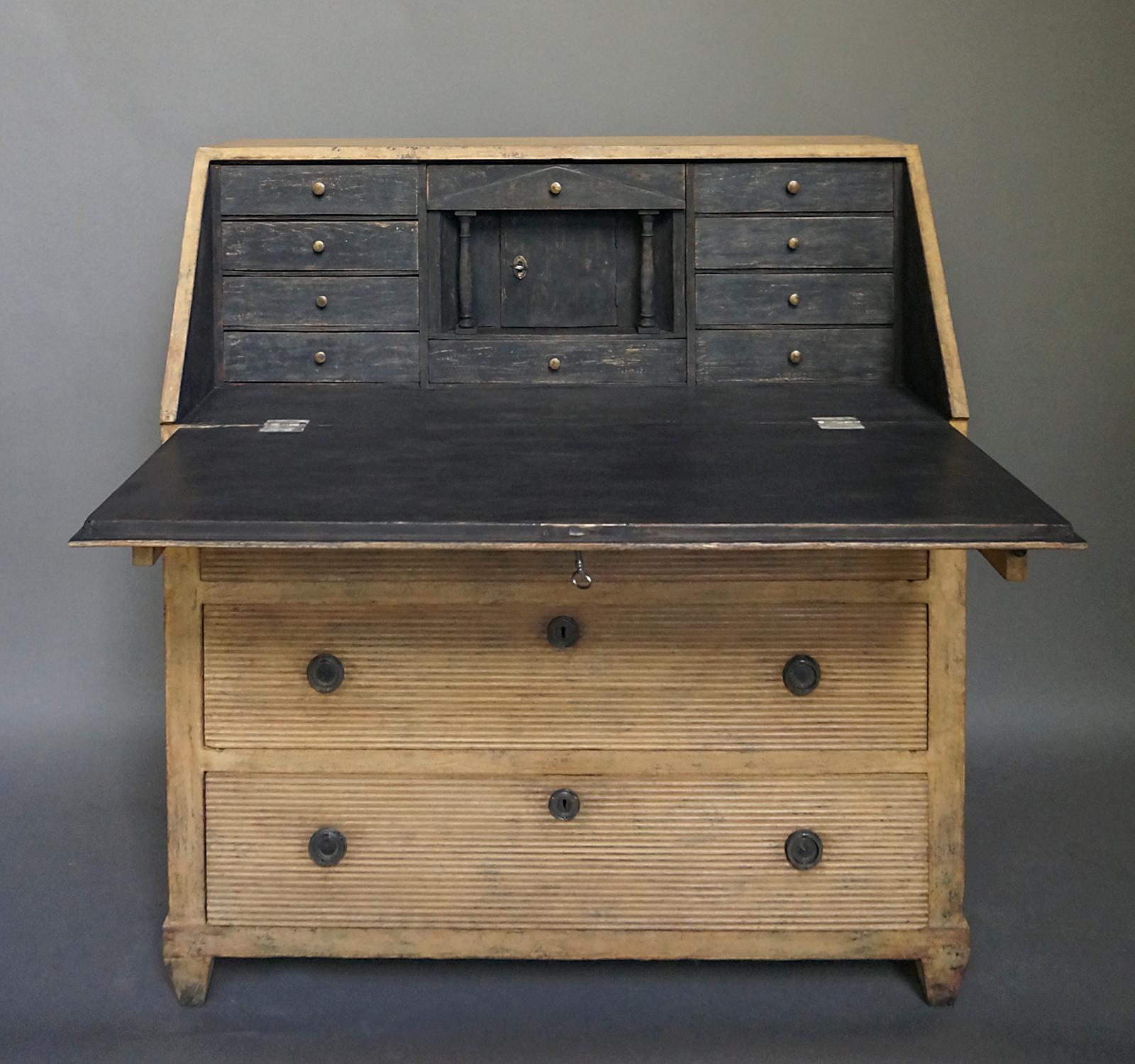 Remarkable neoclassical writing desk, Sweden circa 1850, with original painted surface, original hardware, and no repairs. Behind the slant-front with reeded lozenge is a fitted interior with drawers and a central compartment styled as a Greek