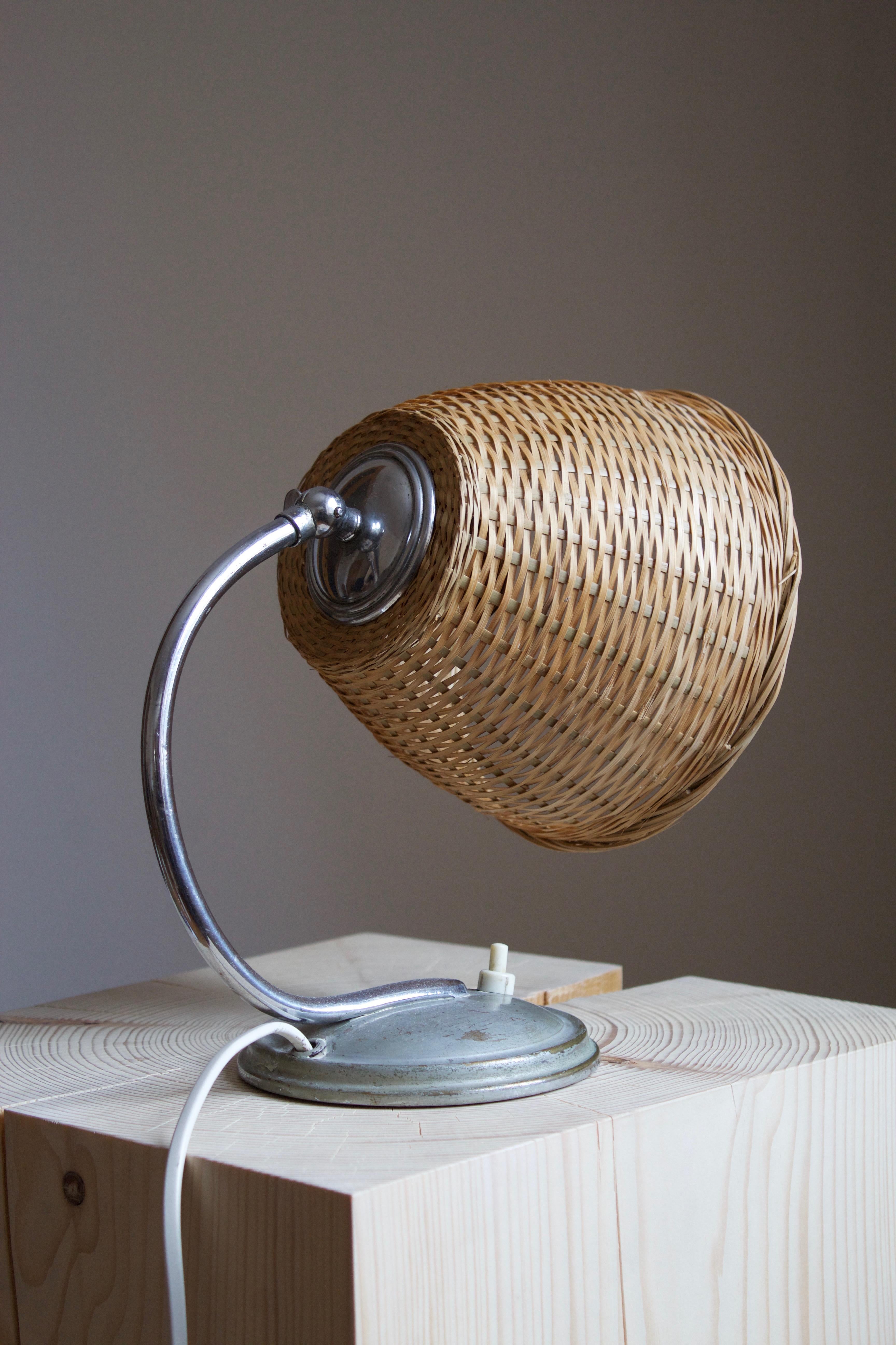 Swedish, Small Functionalist Table Lamp, Metal, Rattan, c. 1940s In Good Condition In High Point, NC