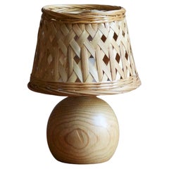 Swedish, Small Minimalist Table Lamp, Turned Solid Pine, Rattan, Sweden, 1970s