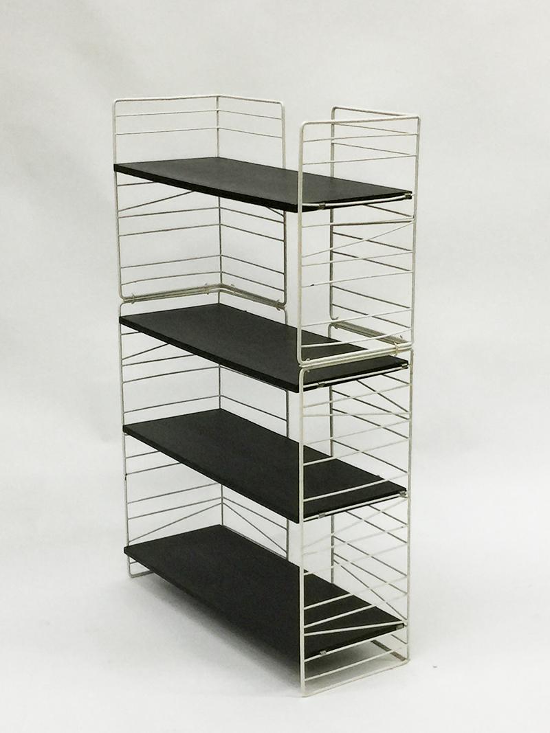 Swedish Standing Wire Bookcase Unit by Sonja, Mid-20th Century

Swedish standing wire bookcase by Sonja with black shelves
Exqvisita style AB Stockholm, Sweden
Mid-20th century
2 units with 4 black shelves and they are adjustable
The measurements of