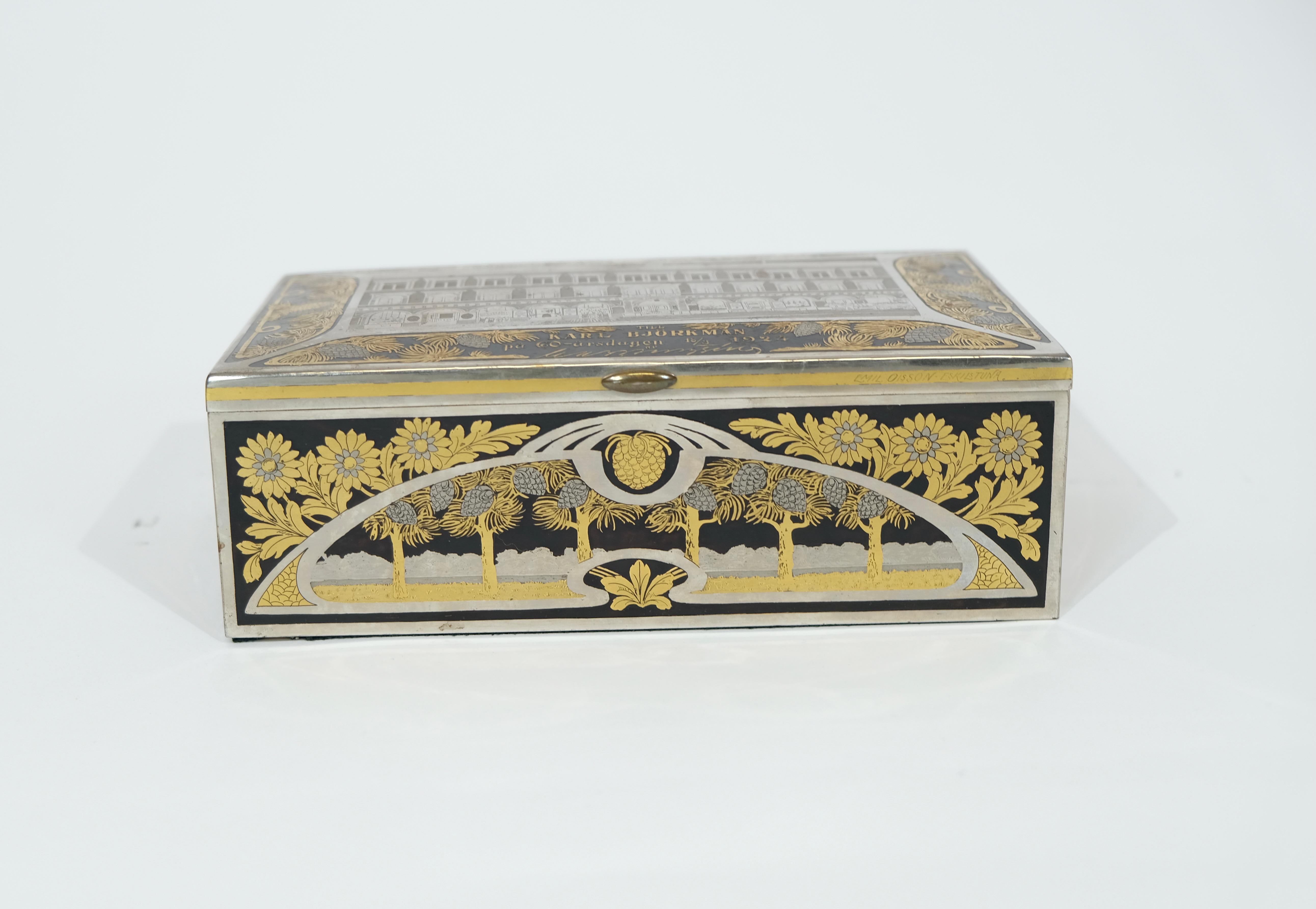A steel cigar box made around 1920. The steel is gilt and bluished with the technique that often was used by specialized workshops in Eskilstuna, Sweden. The quality is very high as always on the works from this workshop. Signed Emil Olsson,