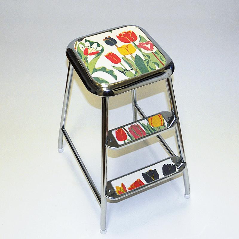 The Swedish classicer - and forever useful step stool of steel with a classic chrome finnish made by Awab 1950s.
Steady and multifunctional stool with two steps in front and a solid square top seat. The stool is very practical to have as an extra