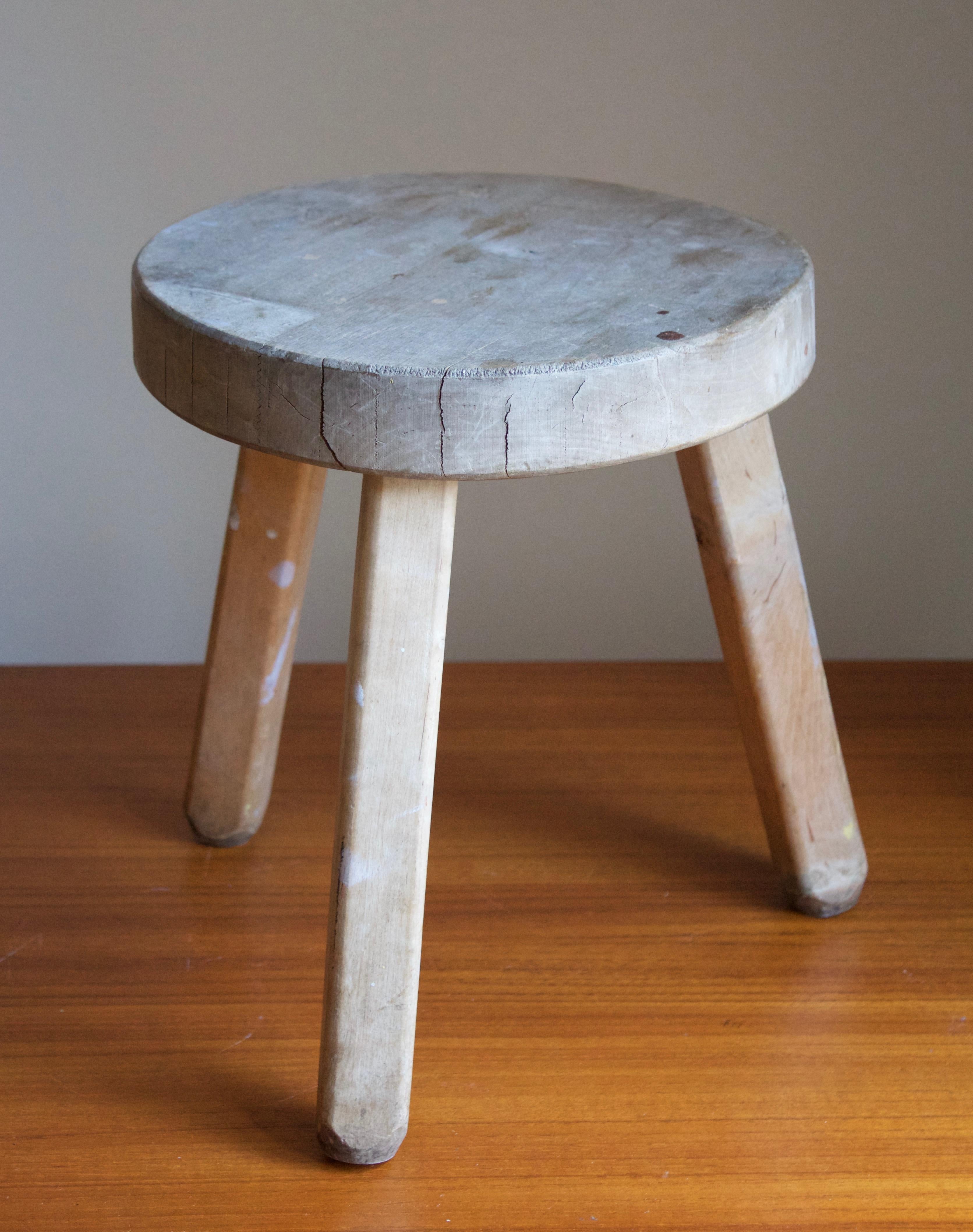 A simple and modernist stool. Produced in Sweden, 1940s. In solid stained oak, with revealed joinery. 

Other designers of the period include Axel Einar Hjorth, Charlotte Perriand, Pierre Jeanneret, Pierre Chapo, and Kaare Klint.