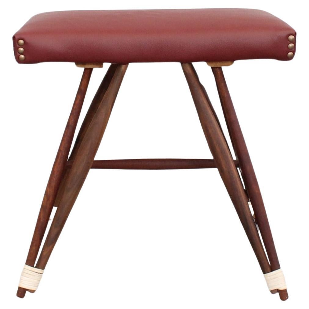 Swedish stool with eiffel base made from walnut and leather For Sale