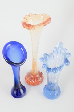 Swedish studio glass. Set of three vases in blue and pink tones, 1970s.