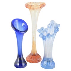 Swedish studio glass. Set of three vases in blue and pink tones, 1970s.
