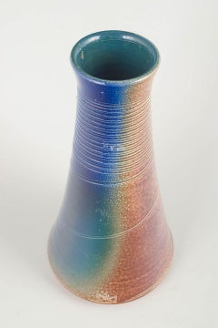 Swedish Studio Potter. Tall conical stoneware vase with multicoloured glaze.