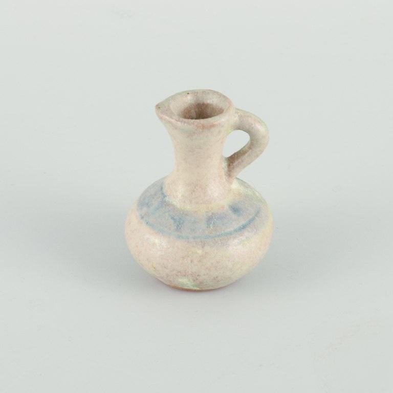 Glazed Swedish Studio Potters, Seven Miniature Vases, Jugs and Snail Shells For Sale