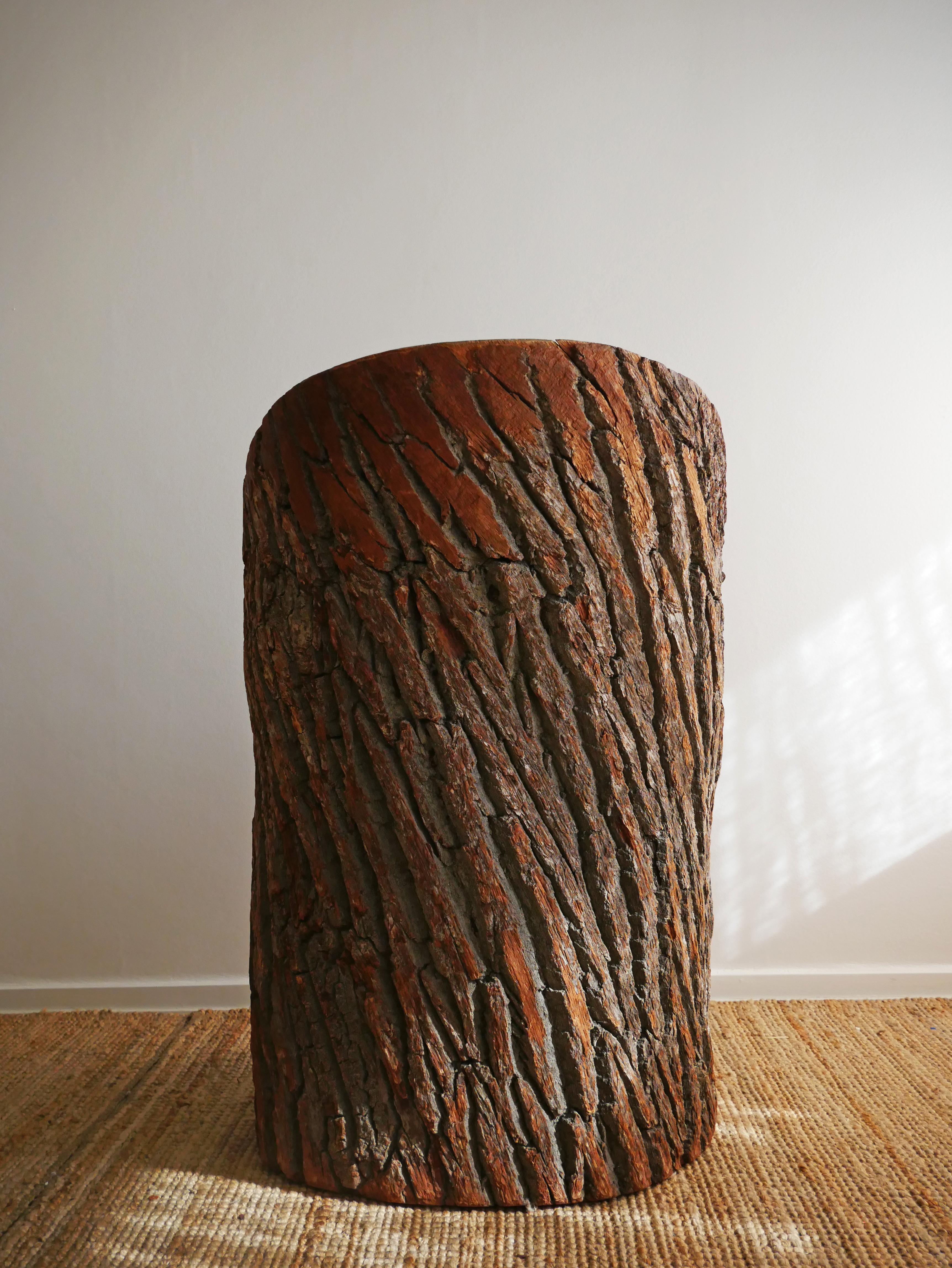 This sculptural chair is an absolute masterpiece in Swedish craftsmanship and aesthetics, approximately made in the 1940s.

Made out of a single peice of an old pine tree with the bark still attached to the stump chair, which makes the natural