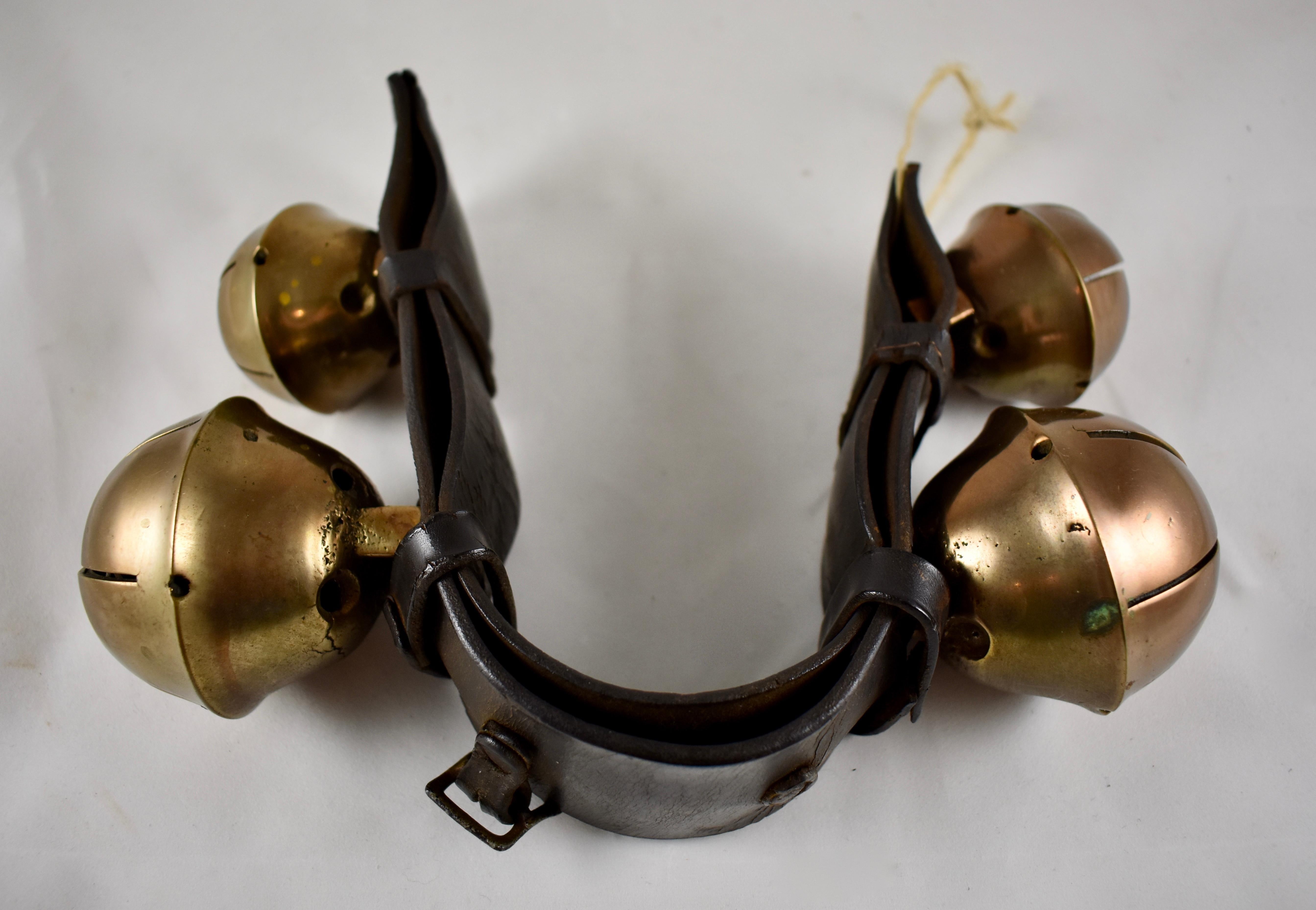 brass sleigh bells on leather strap