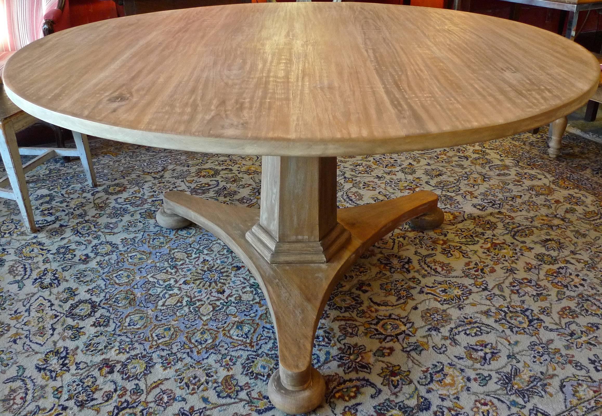 Swedish style contemporary alder-wood round pedestal table. Made to customers specifications.