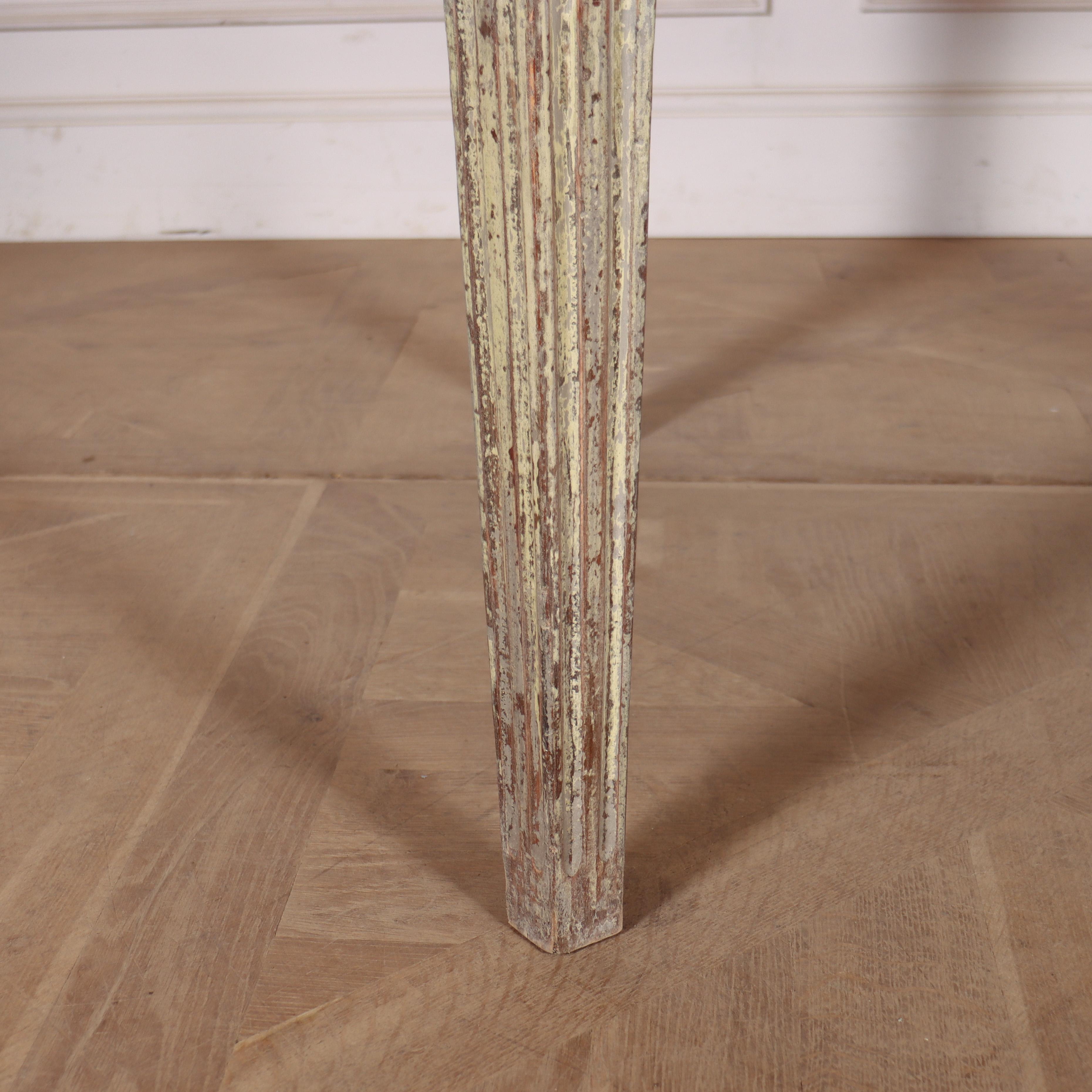 20th century Swedish style extending dining table with a bleached scrubbed oak top and an antiqued paint finish.

This table comes with two leaves at 22inches wide (56cm).

When the table is fully extended its 94.5 inches long (240cm).

The
