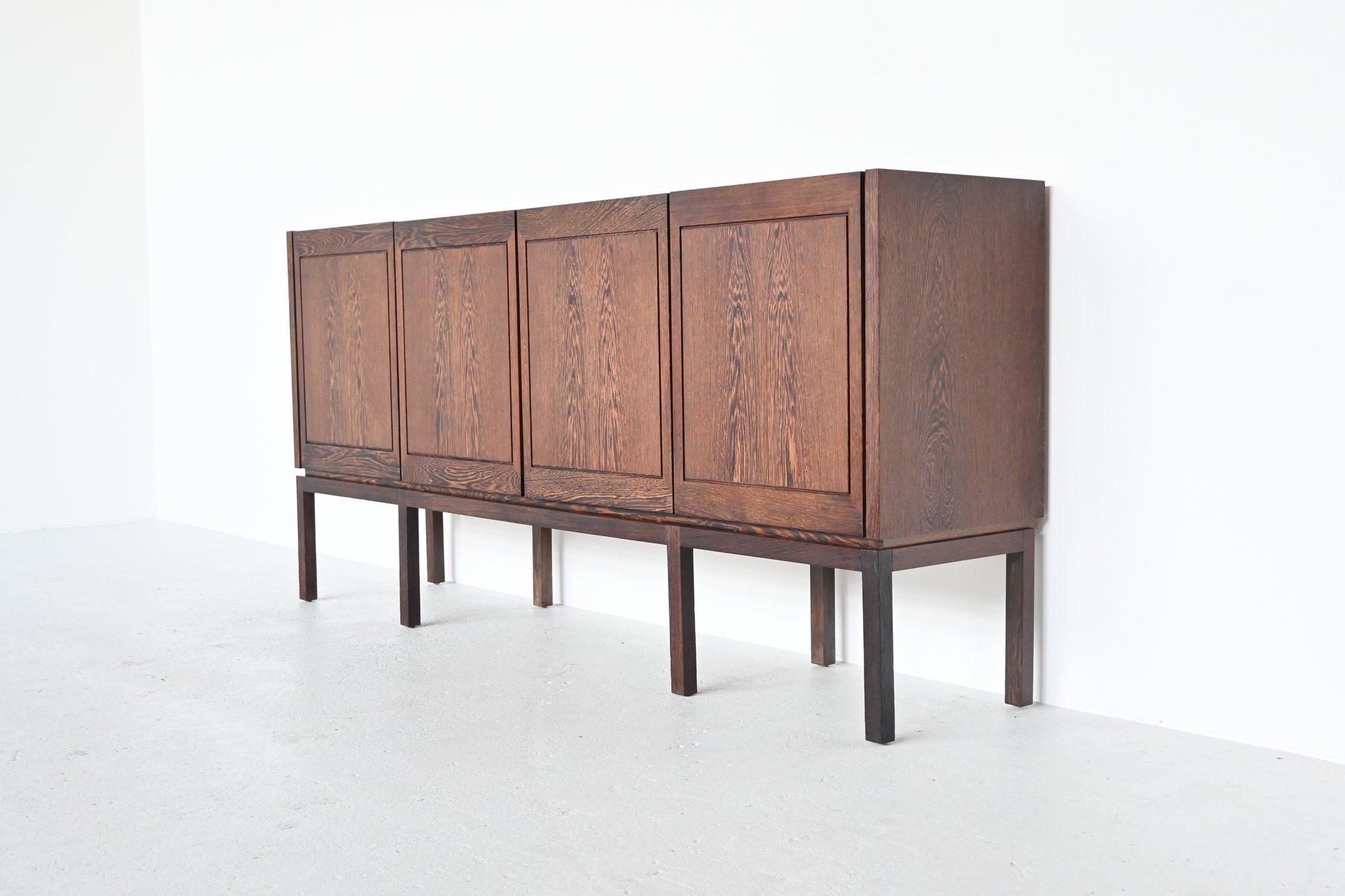 Very nice unusual sideboard manufactured by Royal Board, Sweden, 1960. This symmetric sideboard has a beautiful grain to its wenge wood veneered doors and is in fully original condition. It’s a very nicely crafted piece of Danish midcentury