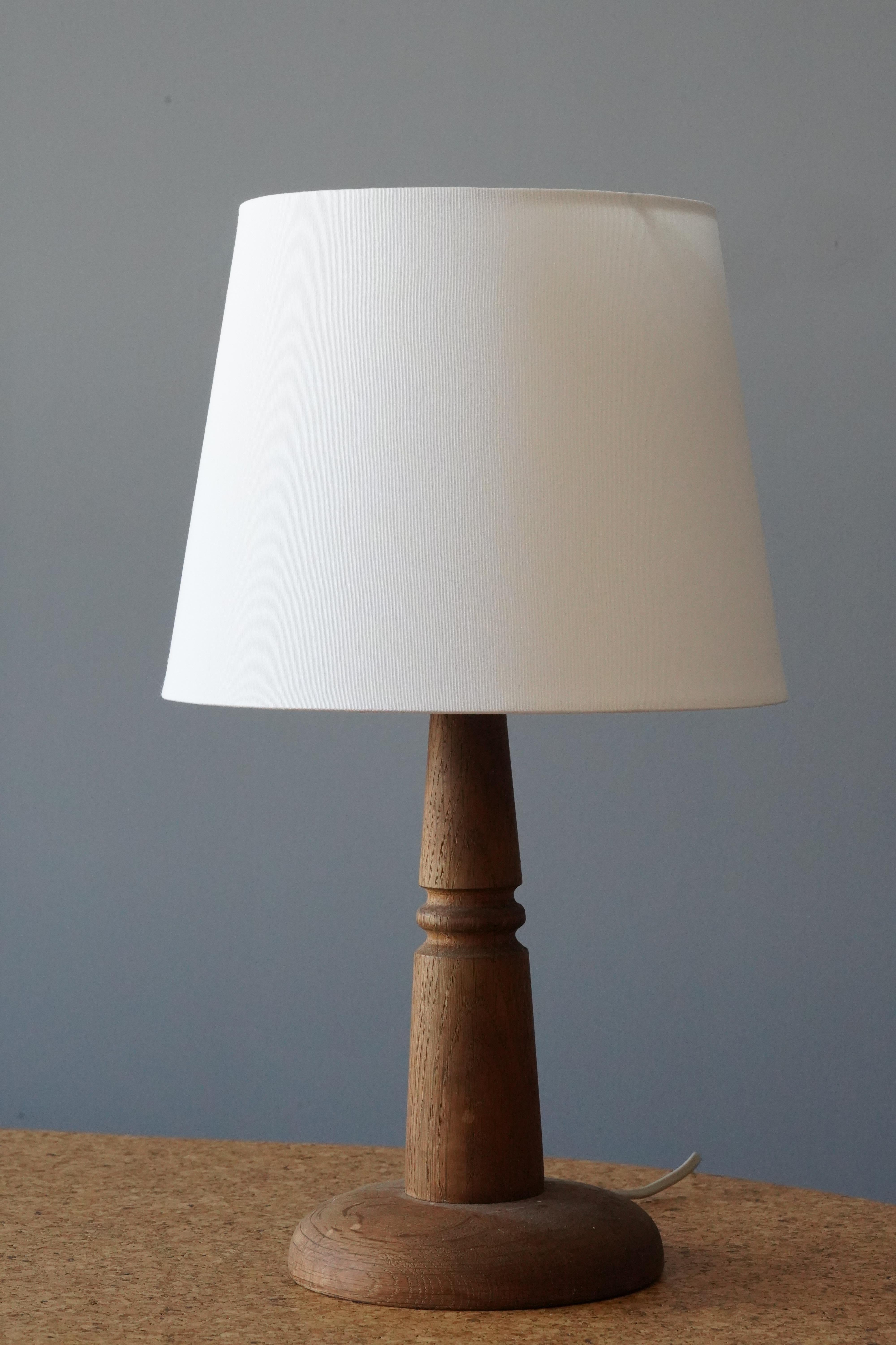 A table lamp designed and produced in Sweden in, c. 1960s.

Stated dimensions exclude lampshade, height includes the socket.