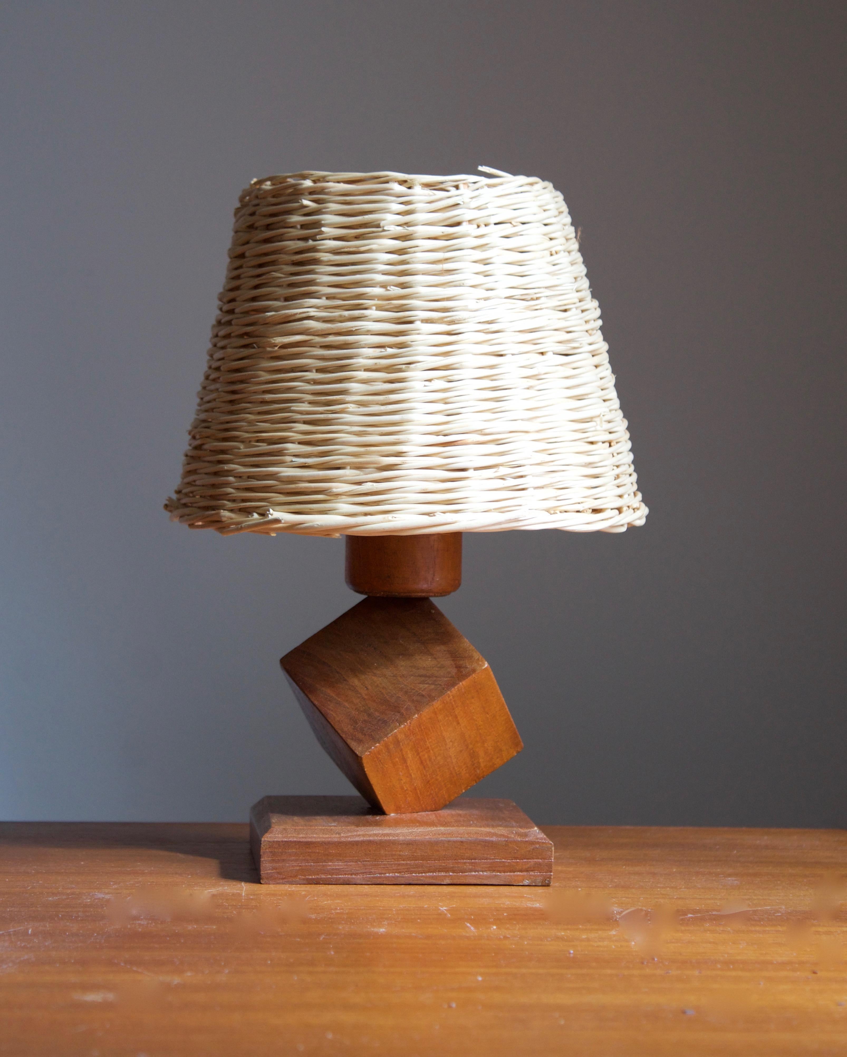 A table lamp designed and produced in Sweden in, c. 1960s.

Stated dimensions exclude lampshade, height includes the socket. Assorted vintage lampshade can be included in purchase upon request.