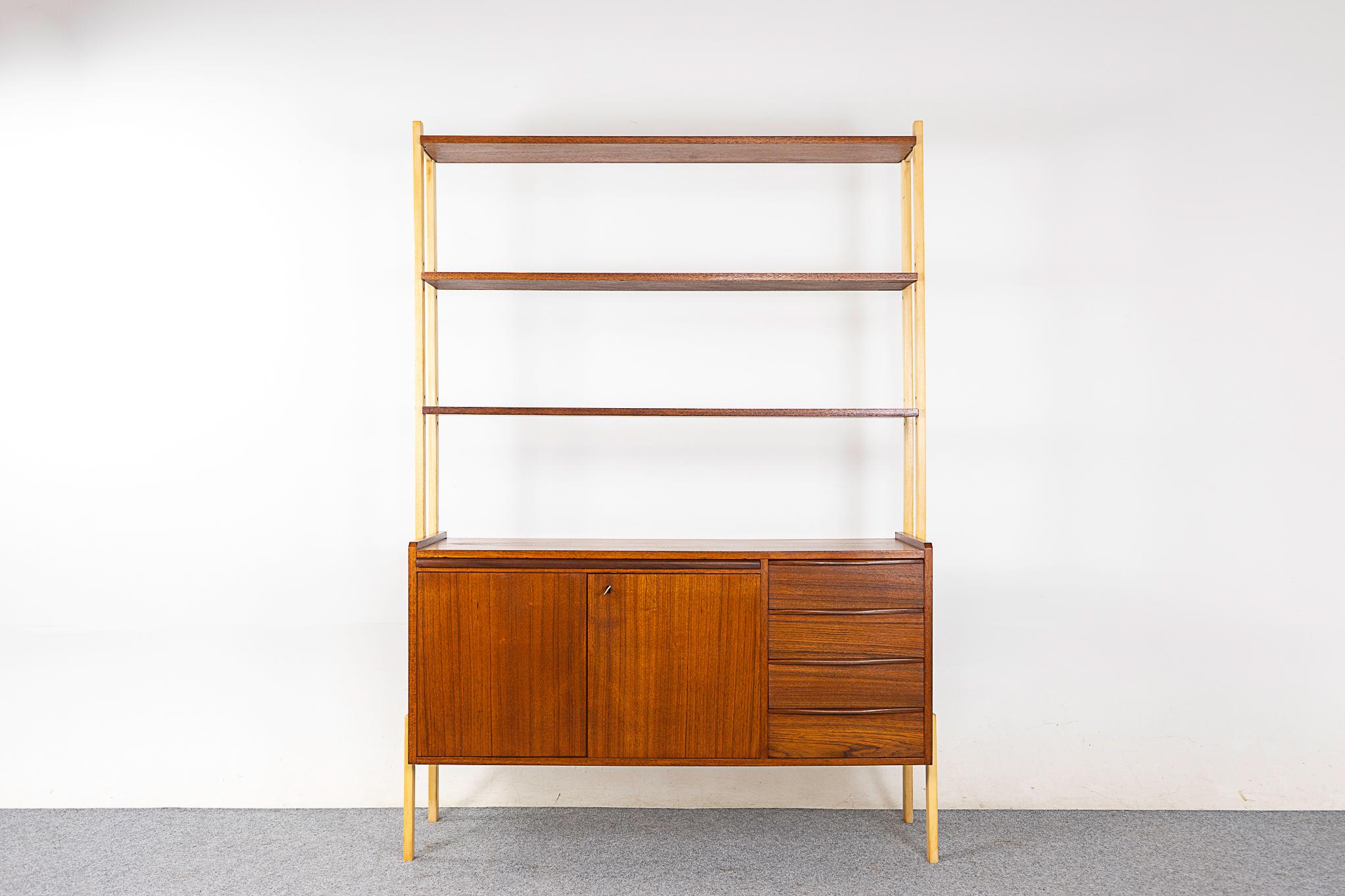 Teak and beech wood Scandinavian bookcase/cabinet, circa 1960's. Highly functional design combines a chest of drawers, slide out desk and open bookshelf! Beautiful contrasting wood types.