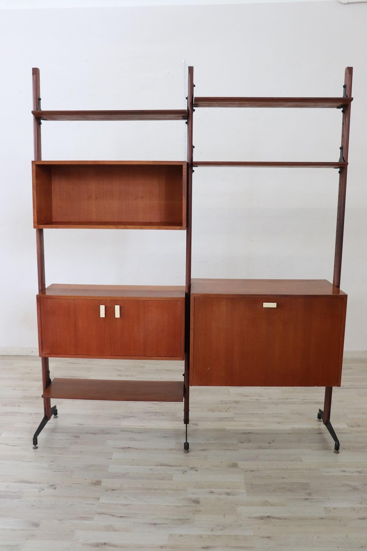 Nice Swedish design modular bookcase, 1960s in teak. Excellent condition, some signs of wear on the inside, see all the photos. This library will be shipped completely disassembled, the assembly is not included in the transport.