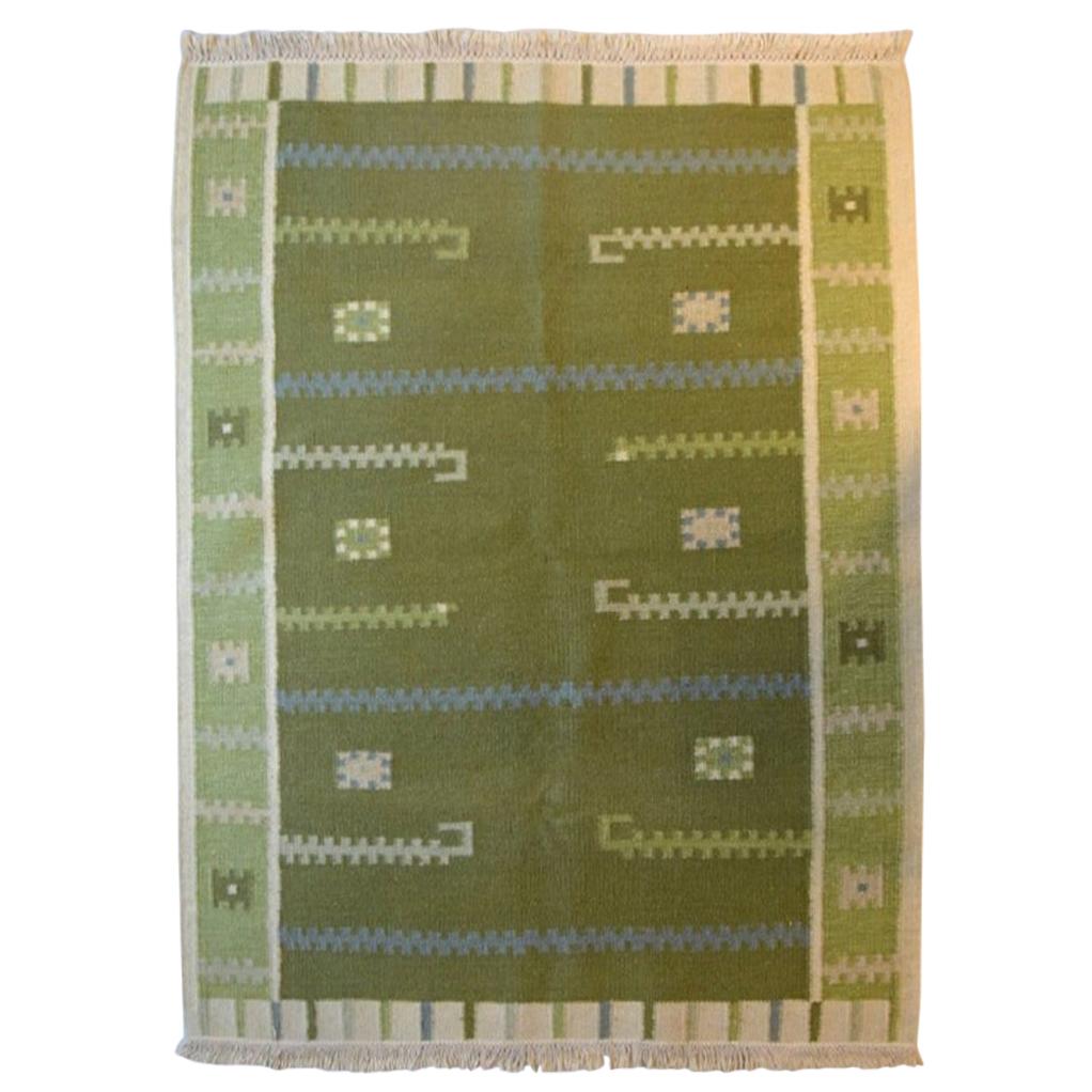 View of Swedish Textile Designer, Handwoven Röllakan Rug with Geometric Fields ...