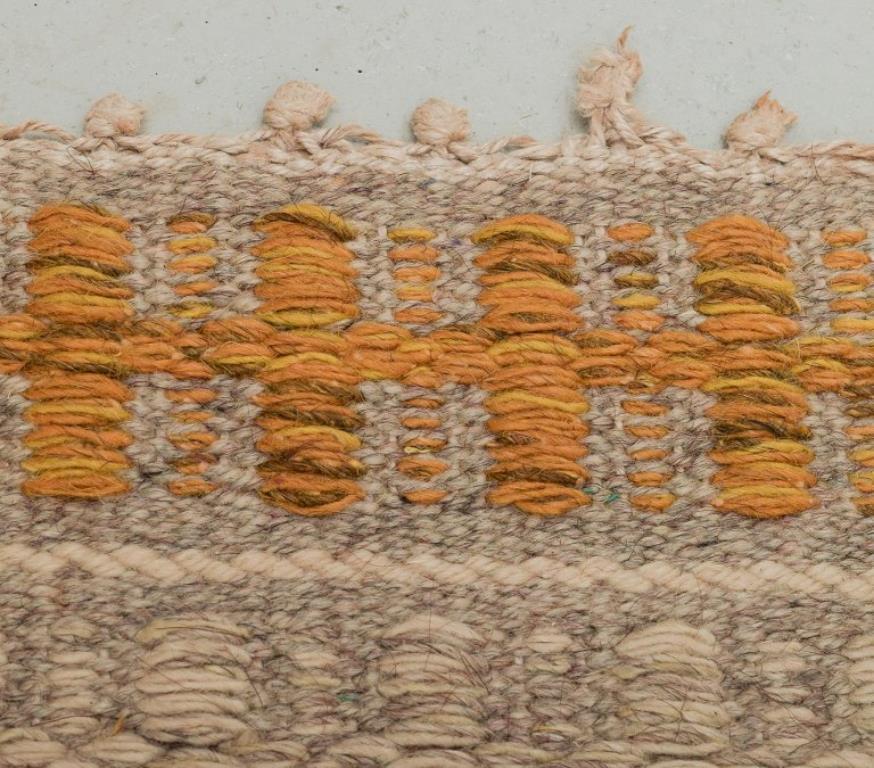 Wool Swedish textile designer. Handwoven carpet in pure wool. Geometric fields. For Sale
