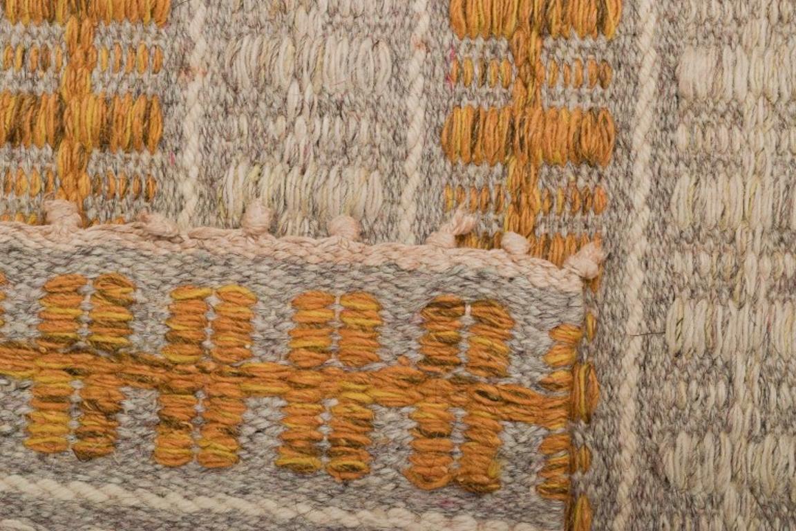 Swedish textile designer. Handwoven carpet in pure wool. Geometric fields. For Sale 1