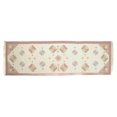 Swedish textile designer. Rölakan wool runner with geometric pattern. 1960s
