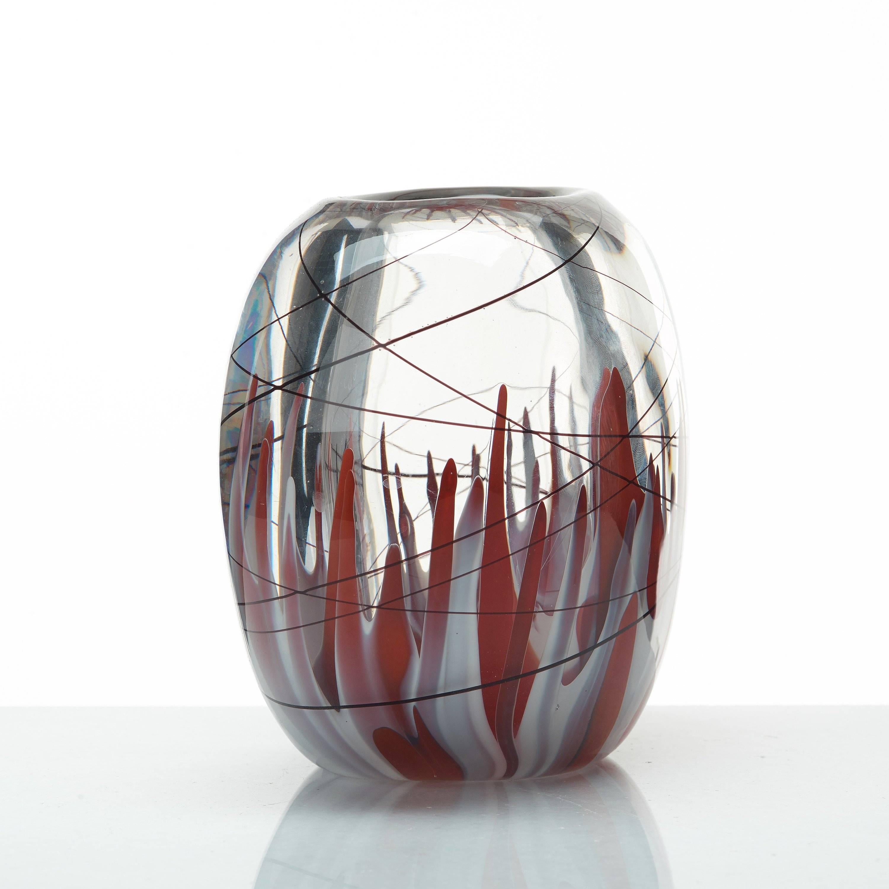 Swedish modern glass vase by Vicke Lindstrand with red and white underlay, 1950s.
Signed LH 1329 and with acid stamp LINDSTRAND Kosta.
Measures: Height 17cm/6.7? and wide 19cm/7.5 and diameter 12.5cm/4.9?.