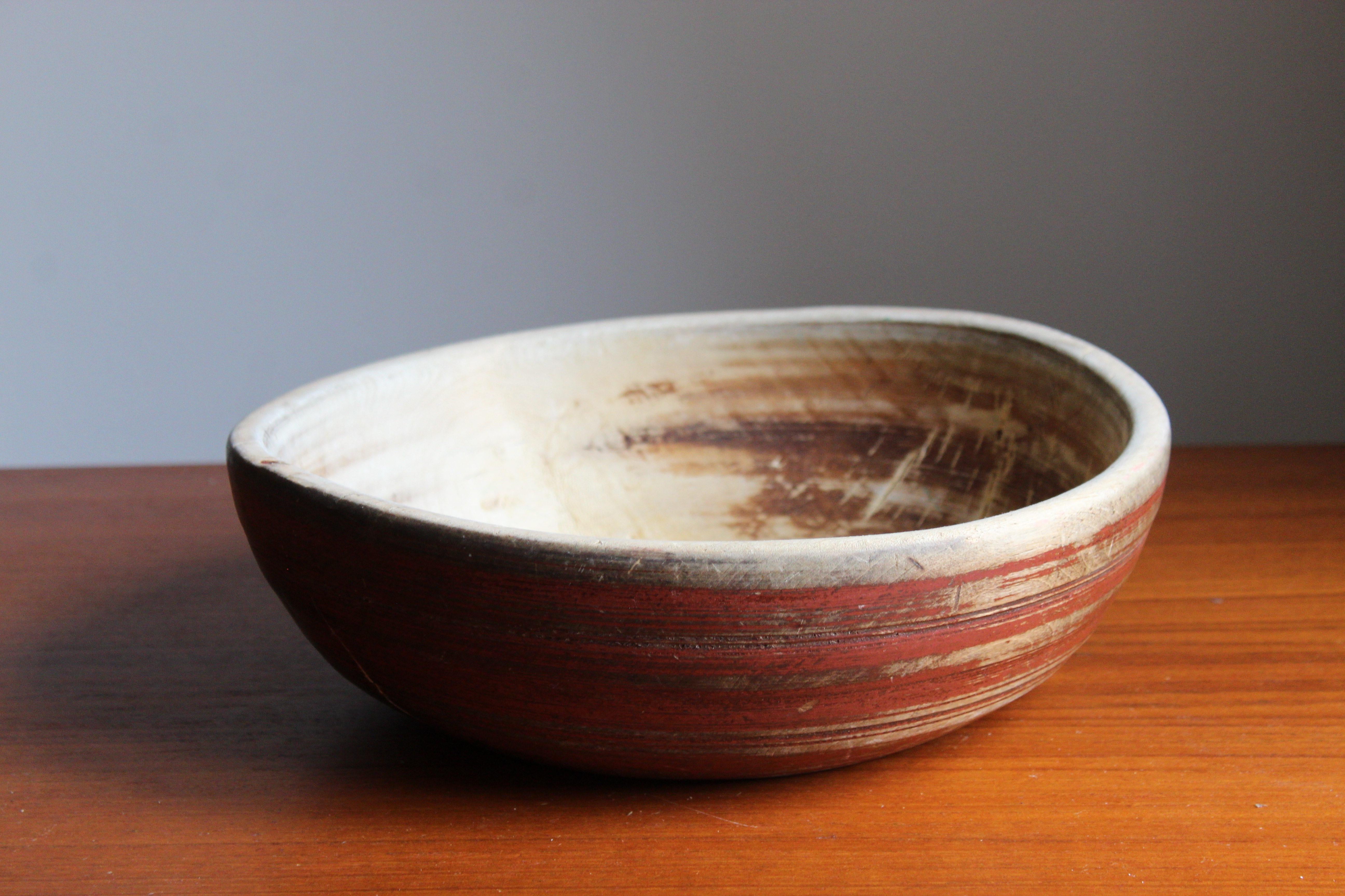 An antique Swedish Folk Craft bowl, 19th century. Features red paint.