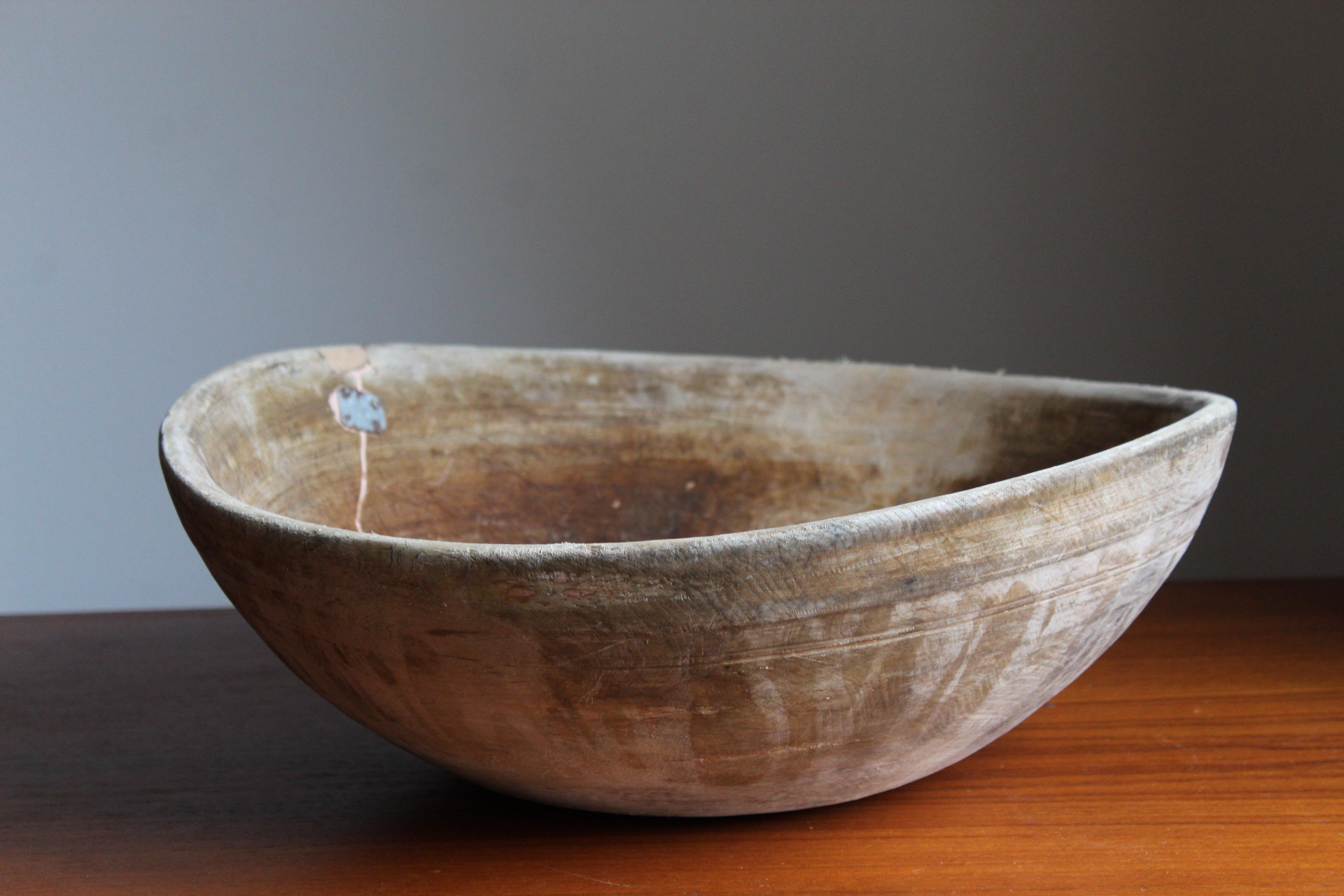 An antique Swedish folk craft bowl, 19th century. With repairs, executed early 20th century.

  