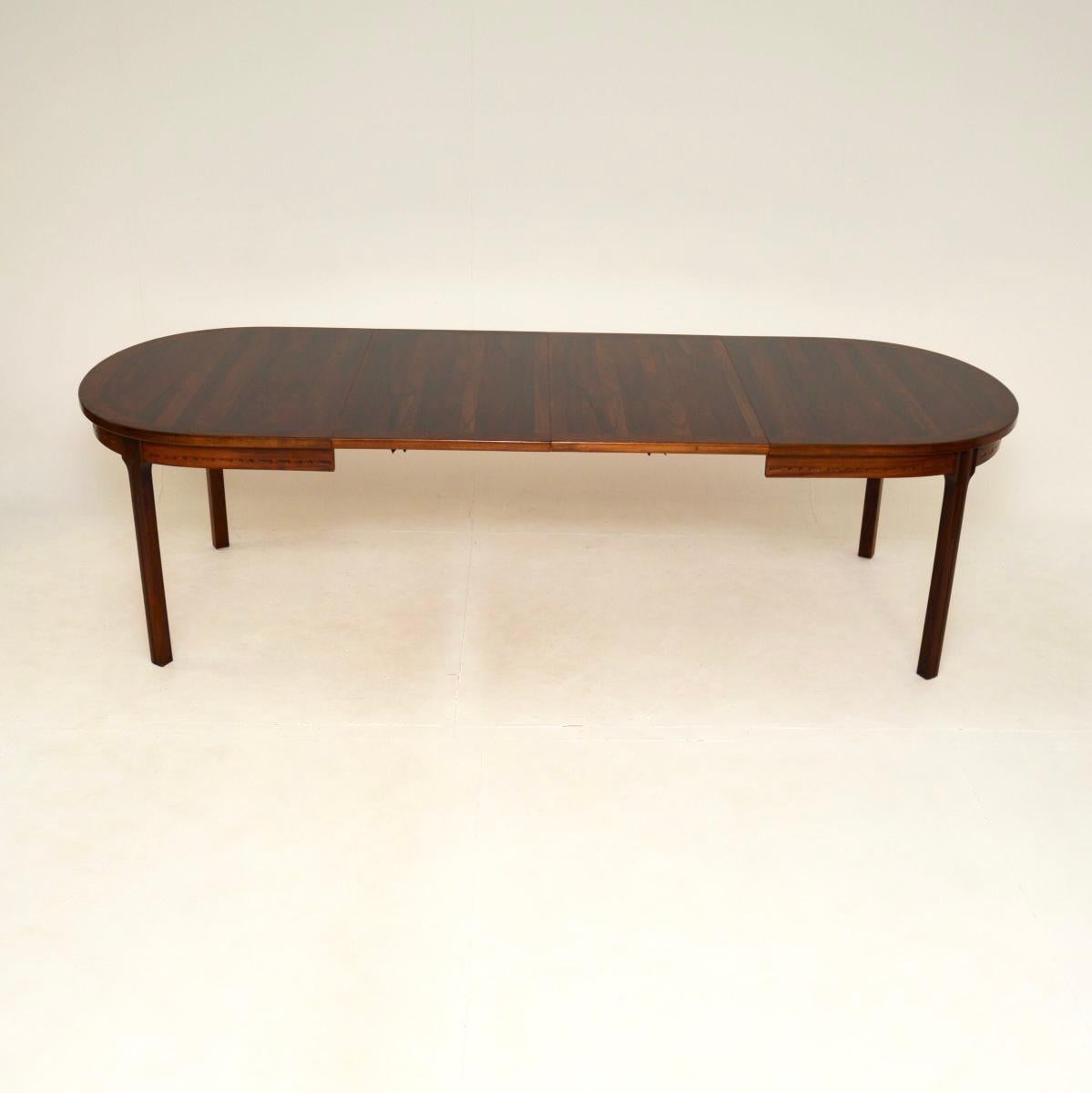 An excellent Swedish vintage dining table by Nils Jonsson. This was made in Sweden by Troeds, it dates from the 1960’s.

The quality is superb, this is a stunning table with a beautiful design. It has a lovely pierced design around the lower edge,