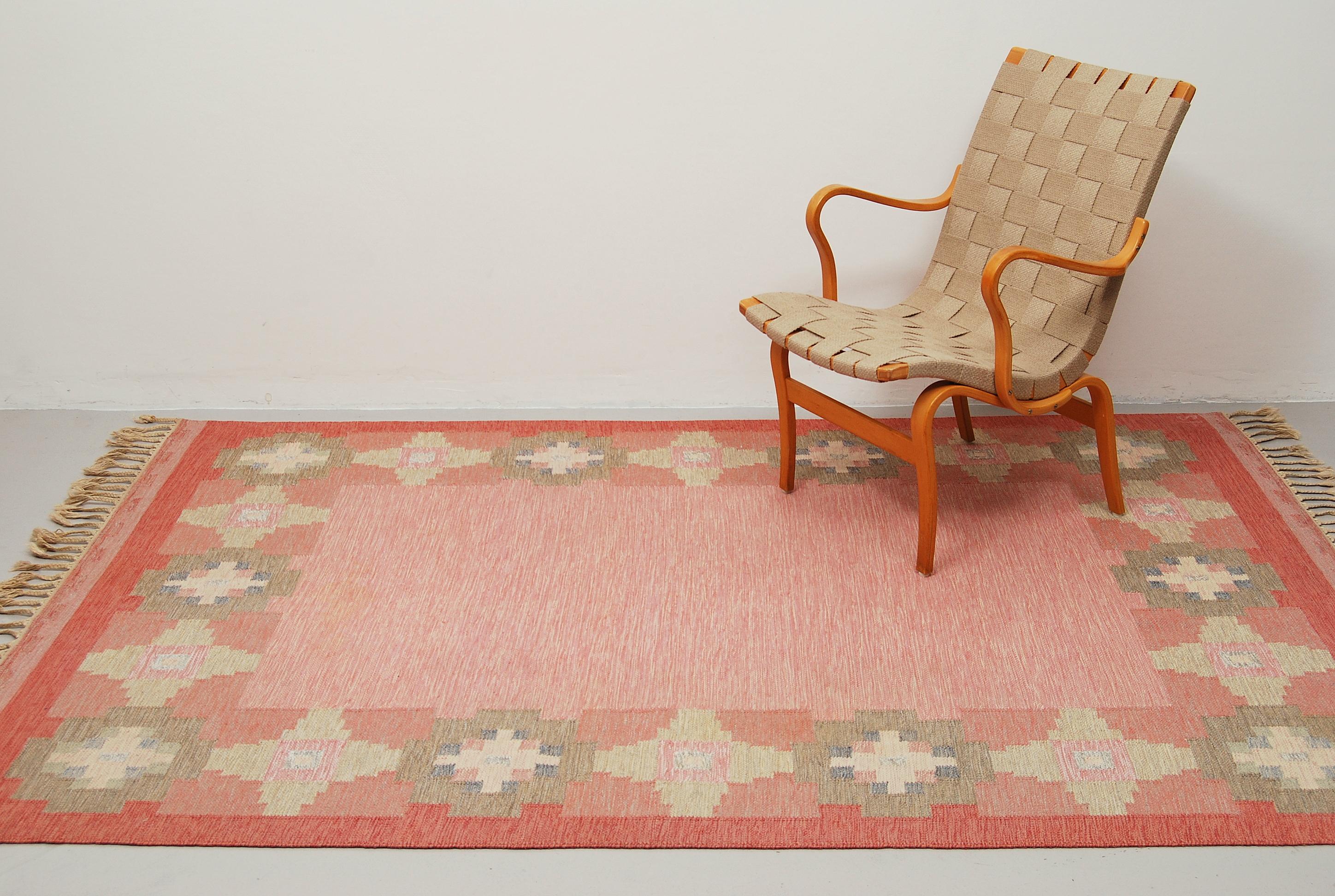 A flat-weave Rölakan carpet named 