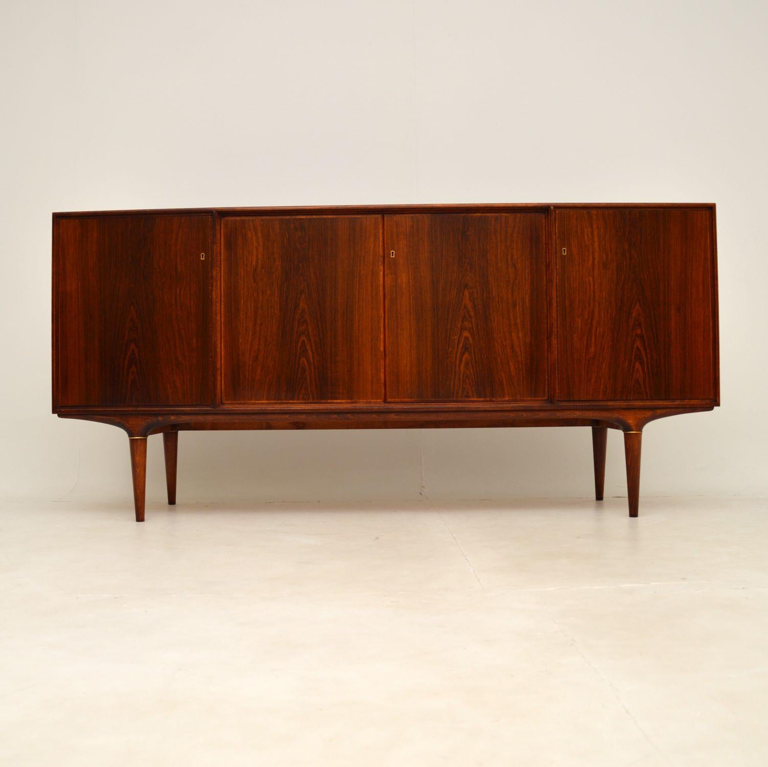 A stunning and rare vintage Swedish sideboard, this model is called the Cortina. It was designed by Svante Skogh, and was made in Seffle in Sweden, it dates from the 1960’s.

This is of absolutely superb quality, and has lots of great features.