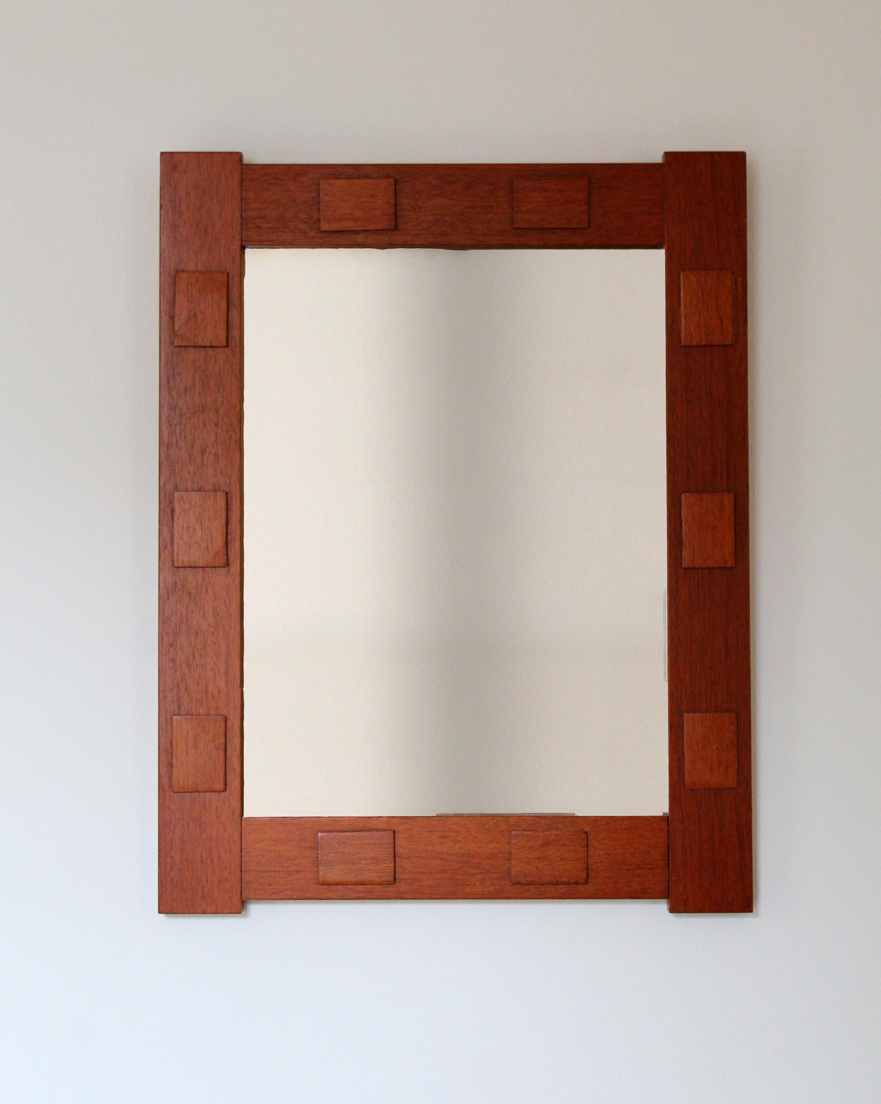 A Swedish modern mirror. Original mirror glass mounted on teak frame.

Other designers of the period include Finn Juhl, Campo Graffi, Fontana Arte, Josef Frank, and Hans Agne Jacobsen.