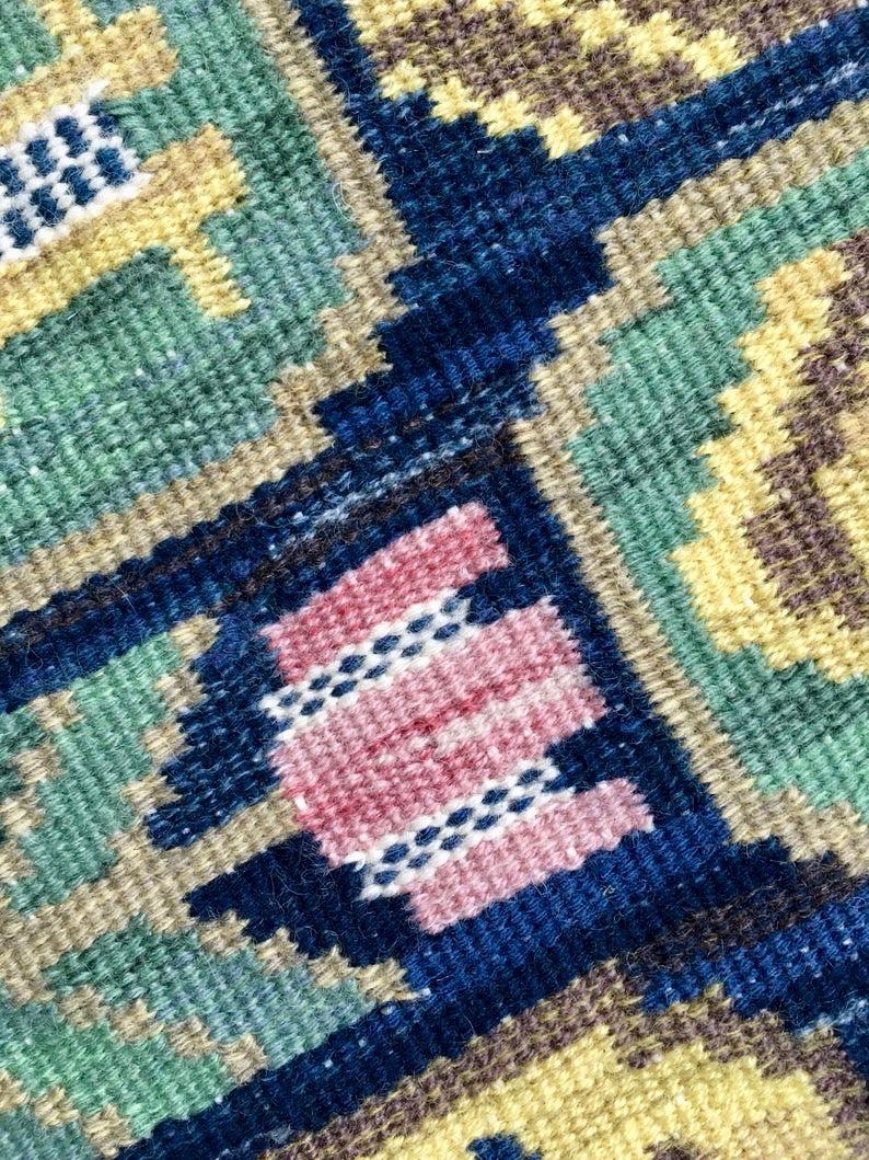 Swedish tapestry designed for adorning a wall. Designed by the famous Märta Måås-Fjetterström in 1926 and made by Eva Bengtsson in September 1993 probably at Bastad in Sweden.