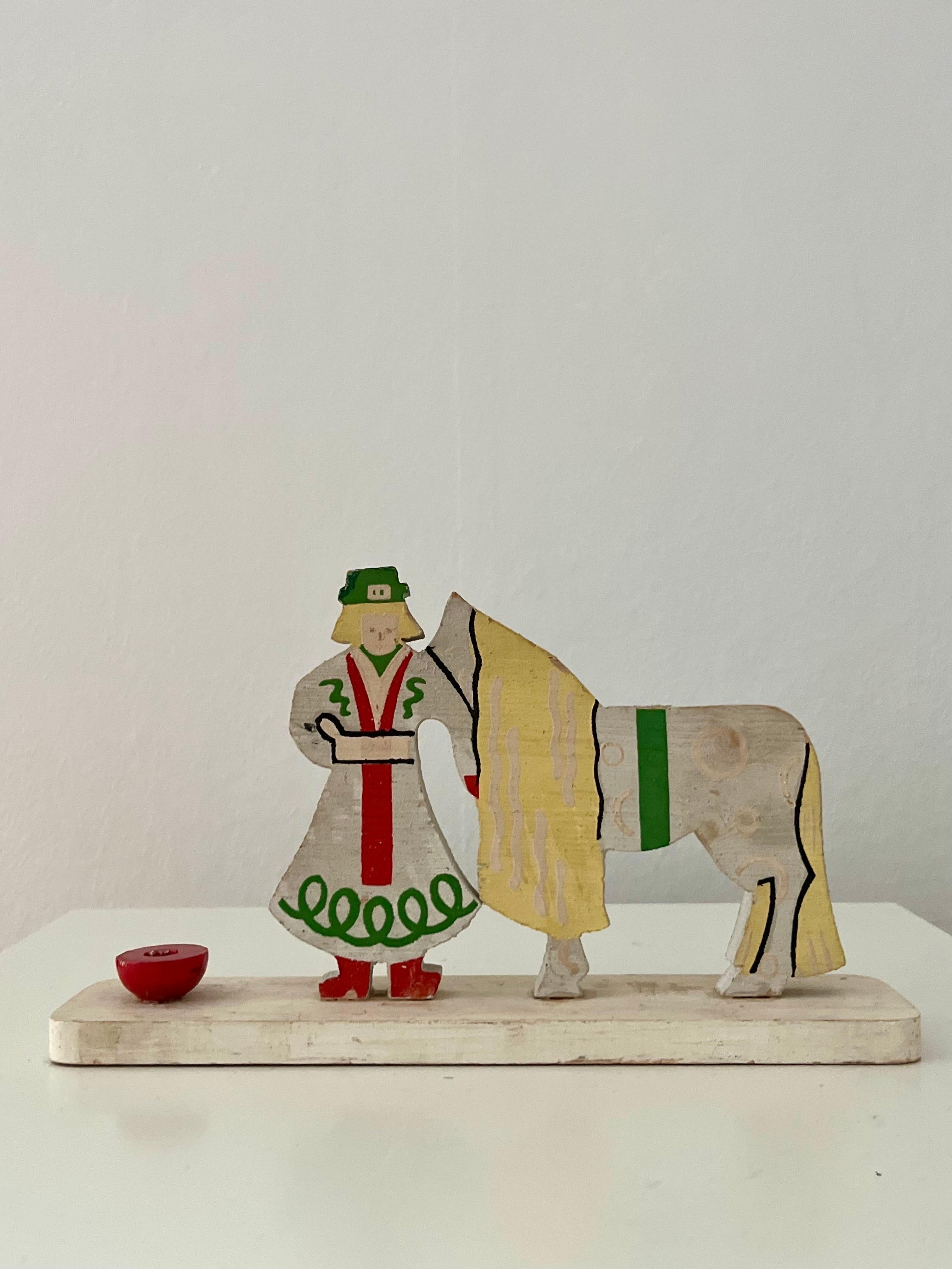 Wood Swedish wood Christmas candle holder w. woman and horse 1960s