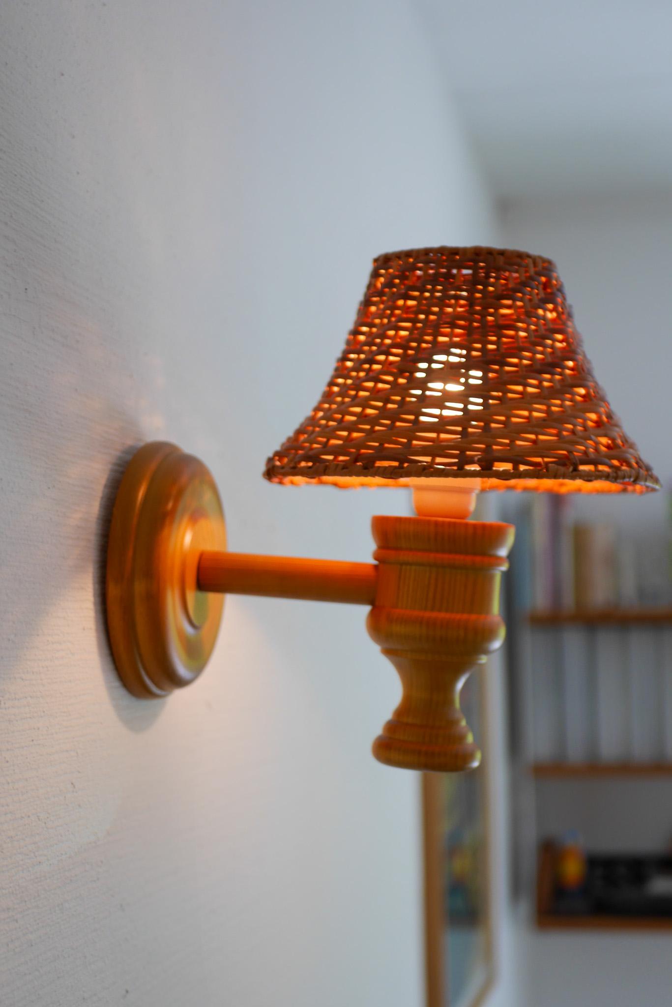 Swedish wooden sconce and rattan shade, a Wall Lamp by Smålandsslöjd Sweden For Sale 3