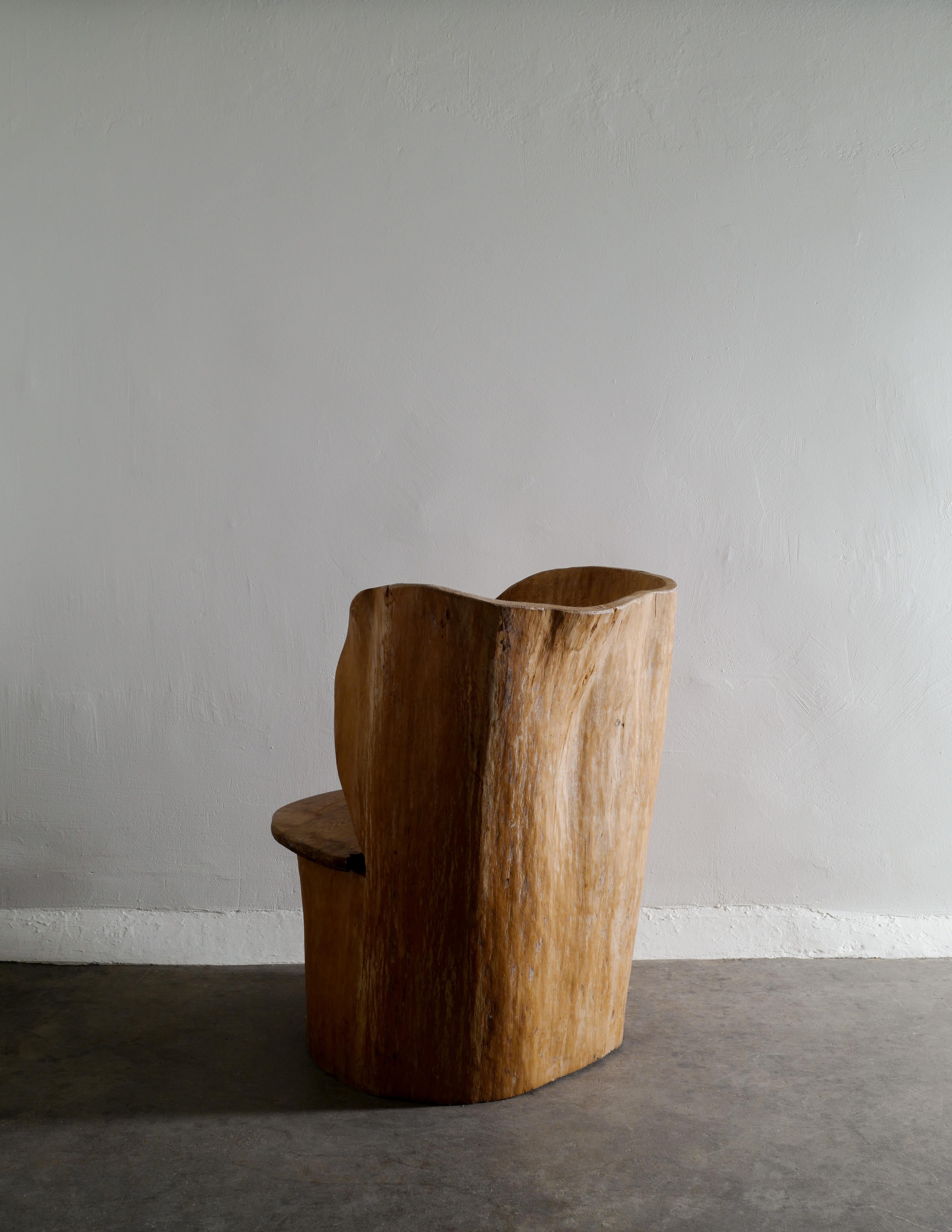 Rare and oversized stump chair in a brutalist and wabi sabi style produced in Sweden during the 1950s. In good vintage and original condition with small signs and patina from age and use. 

Dimensions: H: 88 cm W: 78 cm D: 77 cm SH: 45 cm.